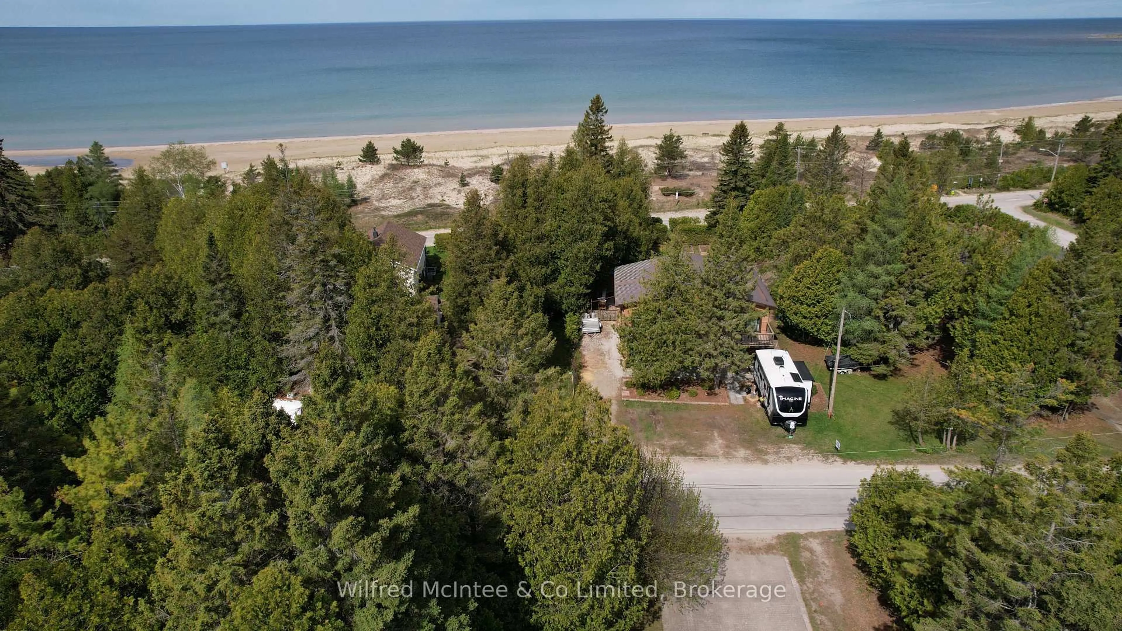 A pic from outside/outdoor area/front of a property/back of a property/a pic from drone, water/lake/river/ocean view for 925 King Edward Ave, South Bruce Peninsula Ontario N0H 2G0