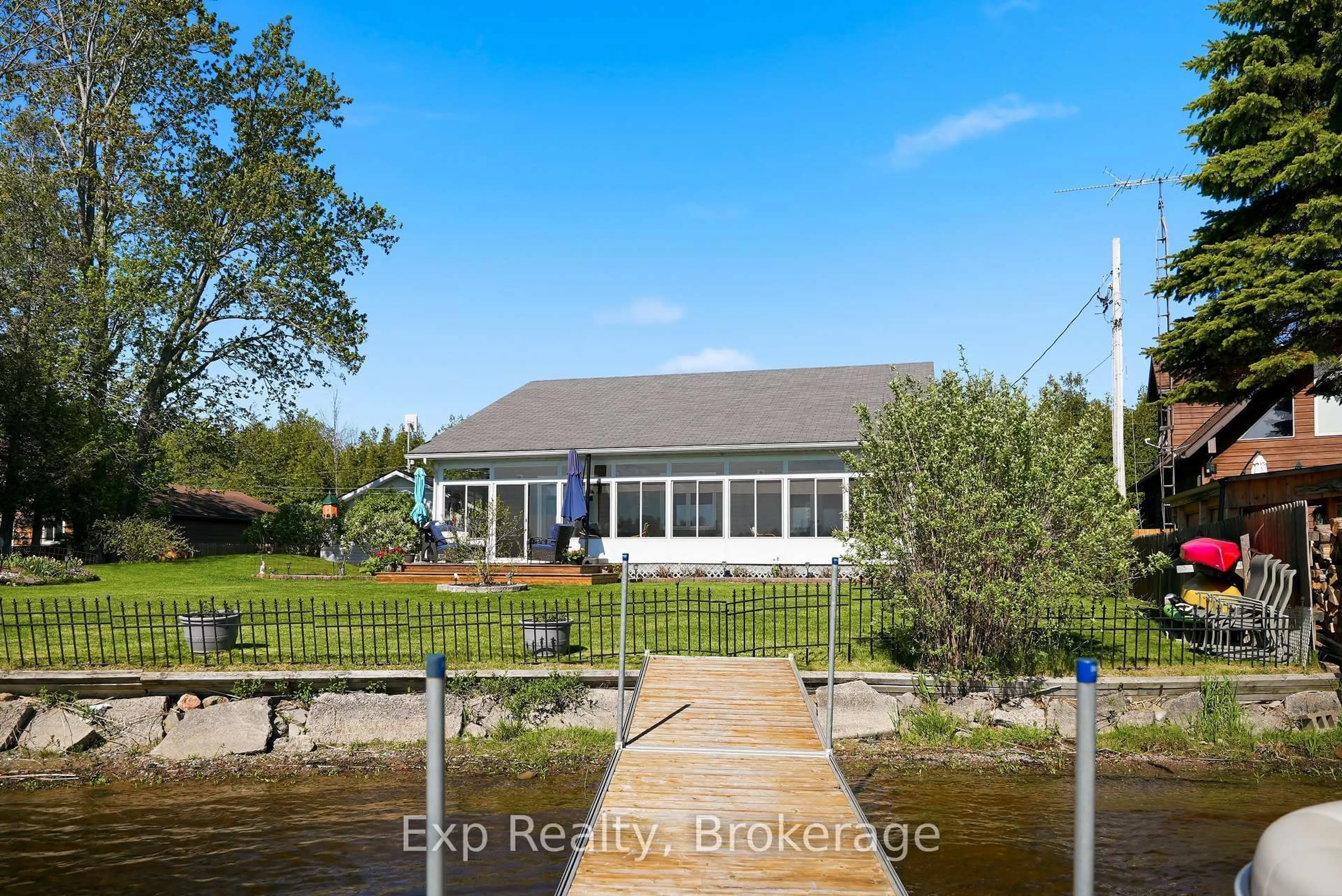 A pic from outside/outdoor area/front of a property/back of a property/a pic from drone, water/lake/river/ocean view for 148 North Beaver Lake Rd, Stone Mills Ontario K0K 2A0
