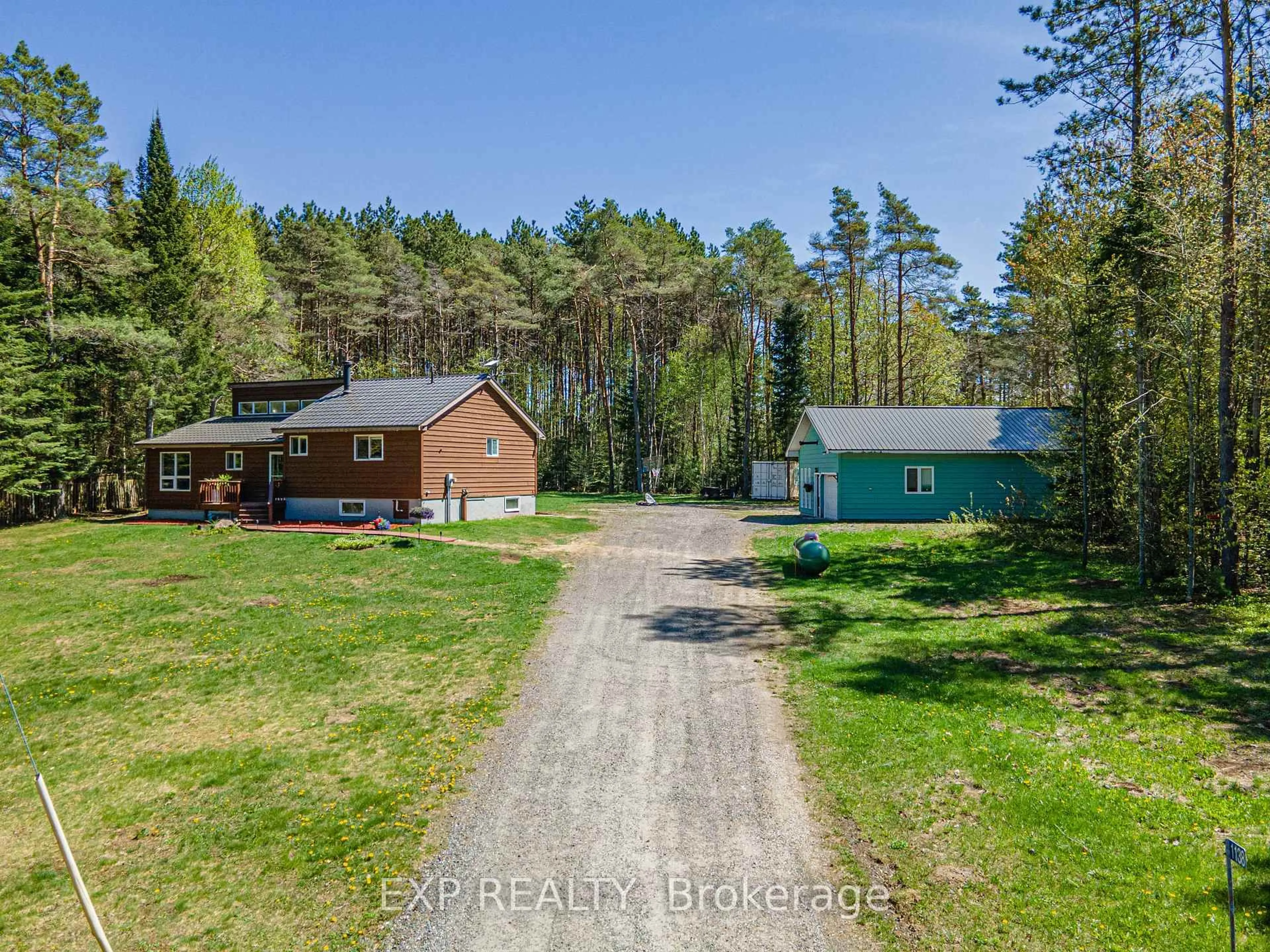 A pic from outside/outdoor area/front of a property/back of a property/a pic from drone, forest/trees view for 1138 Skeleton Lake 2 Rd, Muskoka Lakes Ontario P0B 1M0