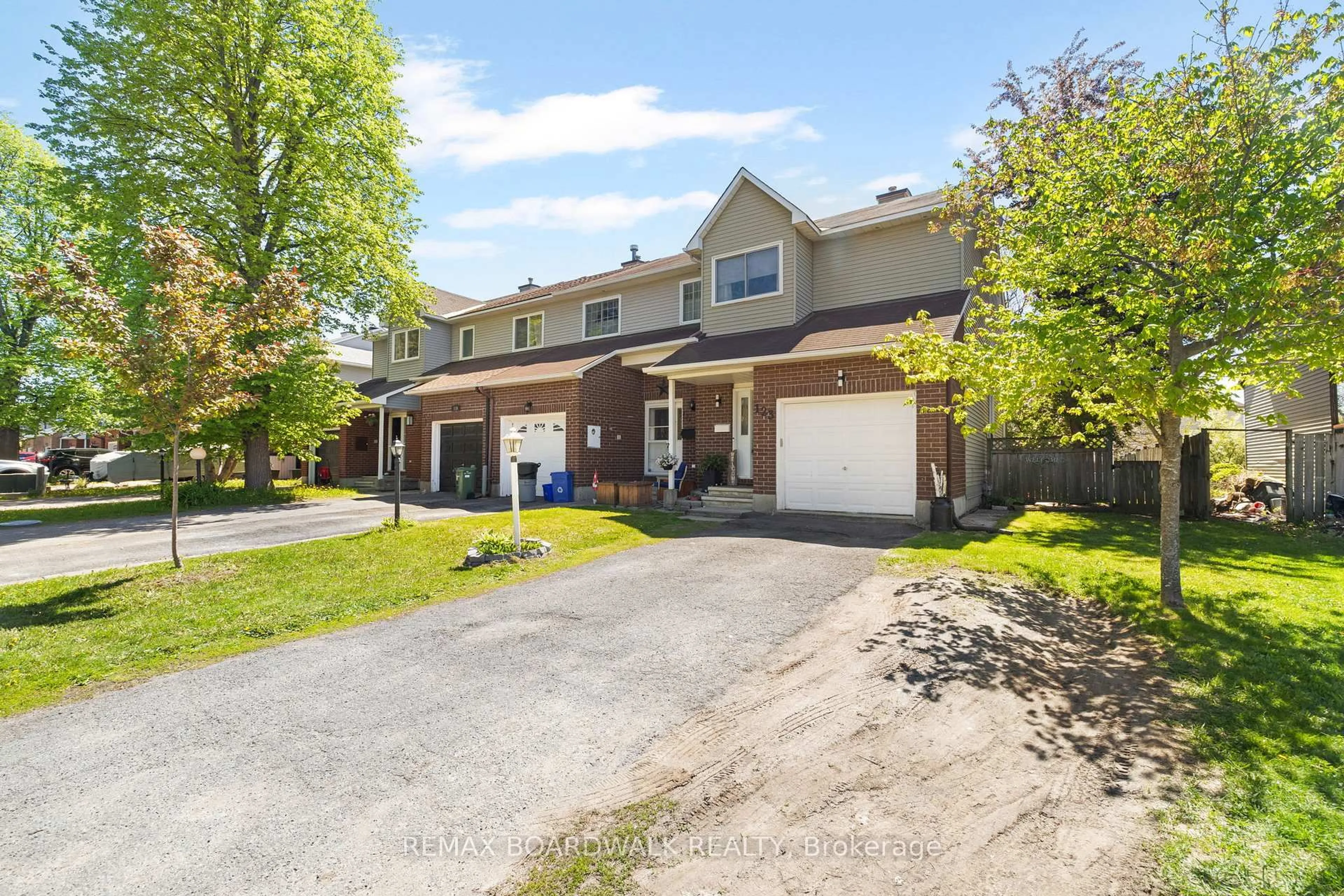 A pic from outside/outdoor area/front of a property/back of a property/a pic from drone, street for 123 Halley St, Ottawa Ontario K2J 3R8