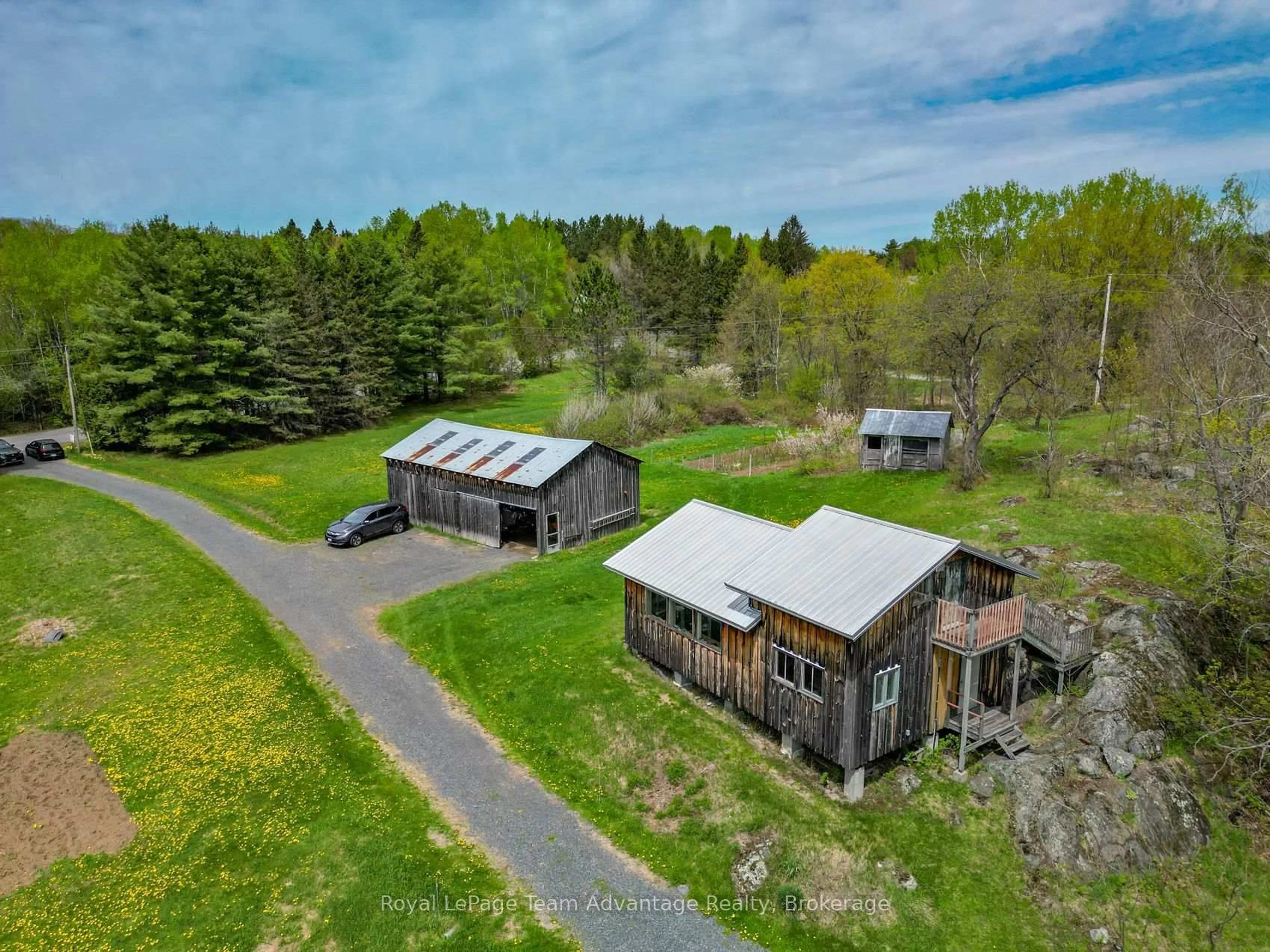 A pic from outside/outdoor area/front of a property/back of a property/a pic from drone, unknown for 315 Lorimer Lake Rd, McDougall Ontario P2A 2W7