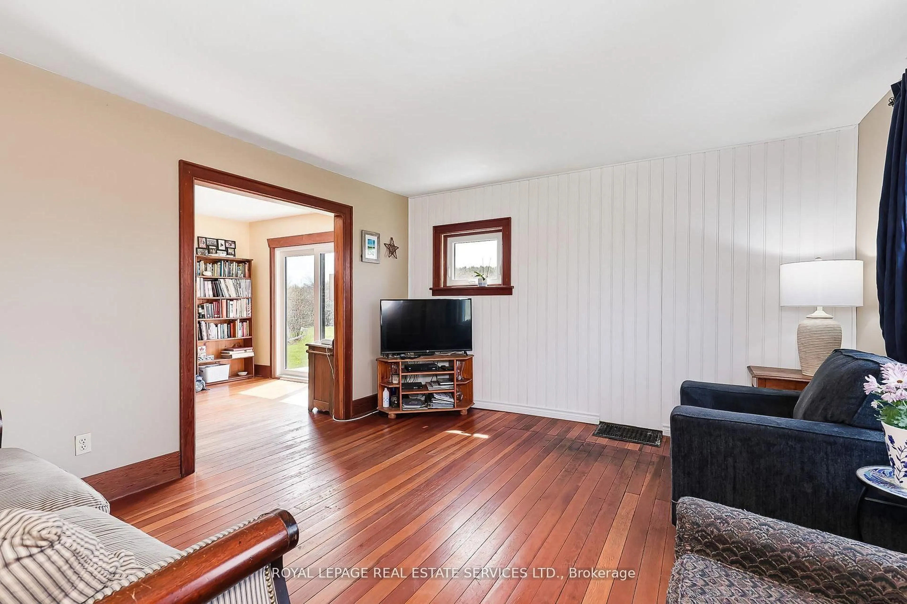 Living room with furniture, wood/laminate floor for 58111 12th Line, Meaford Ontario N4L 1W5