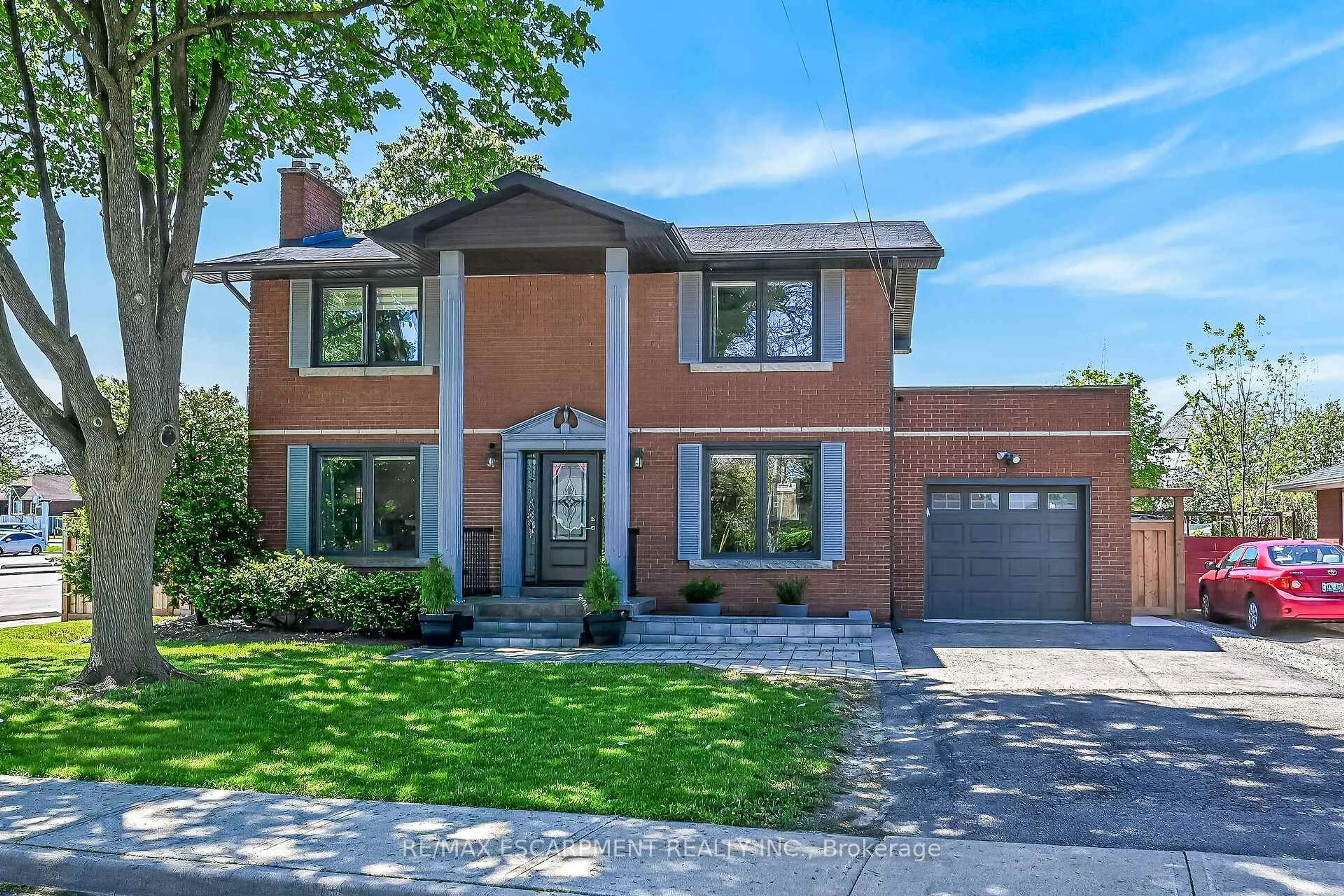 Home with brick exterior material, street for 1 Sandringham Ave, Hamilton Ontario L9C 2H3