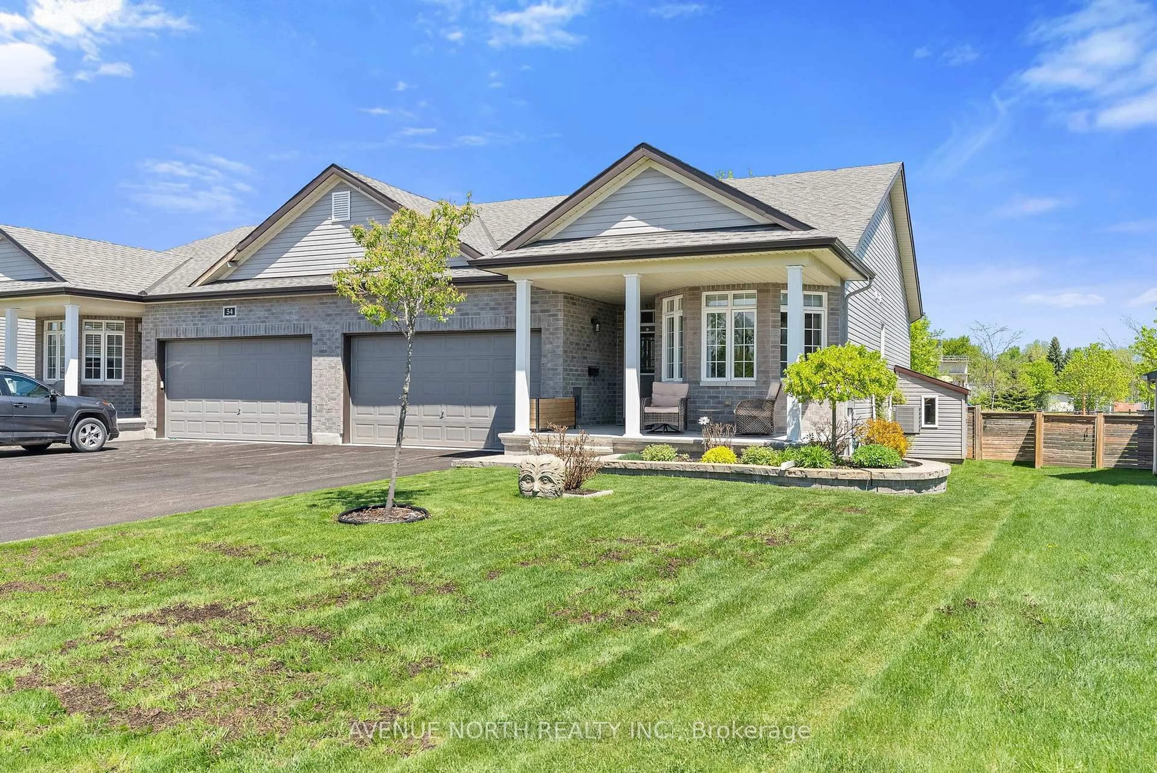 Home with vinyl exterior material, street for 52 Nixon Farm Dr, Richmond Ontario K0A 2Z0