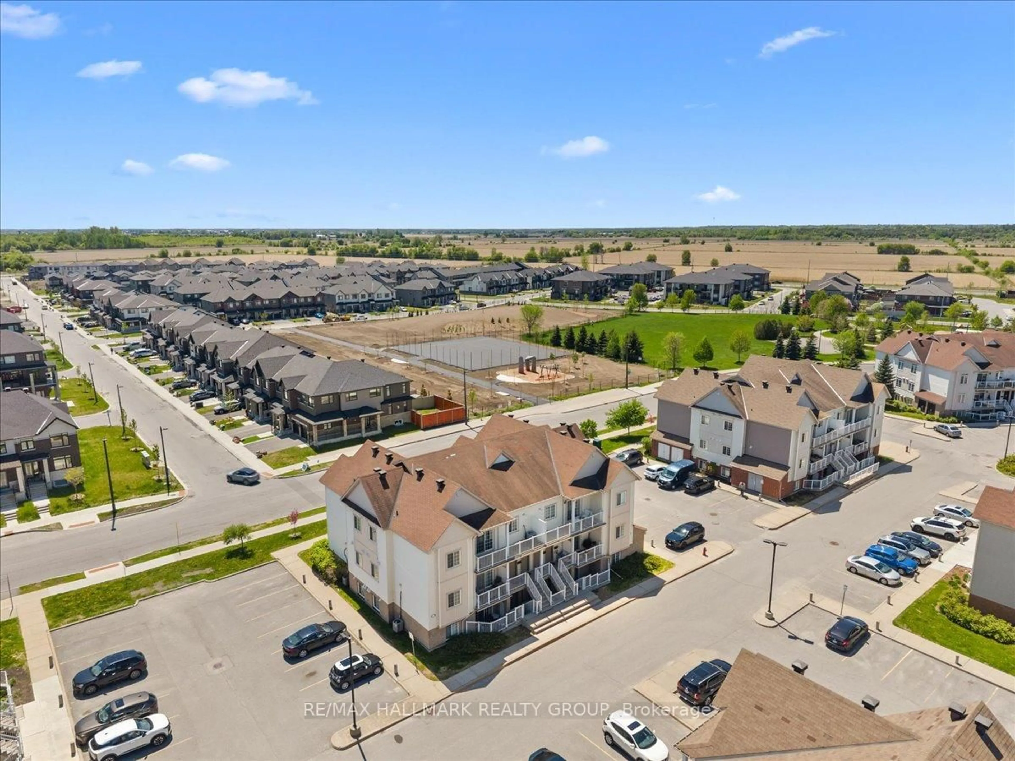 A pic from outside/outdoor area/front of a property/back of a property/a pic from drone, unknown for 102 Artesa Private #I, Ottawa Ontario K2S 0J8