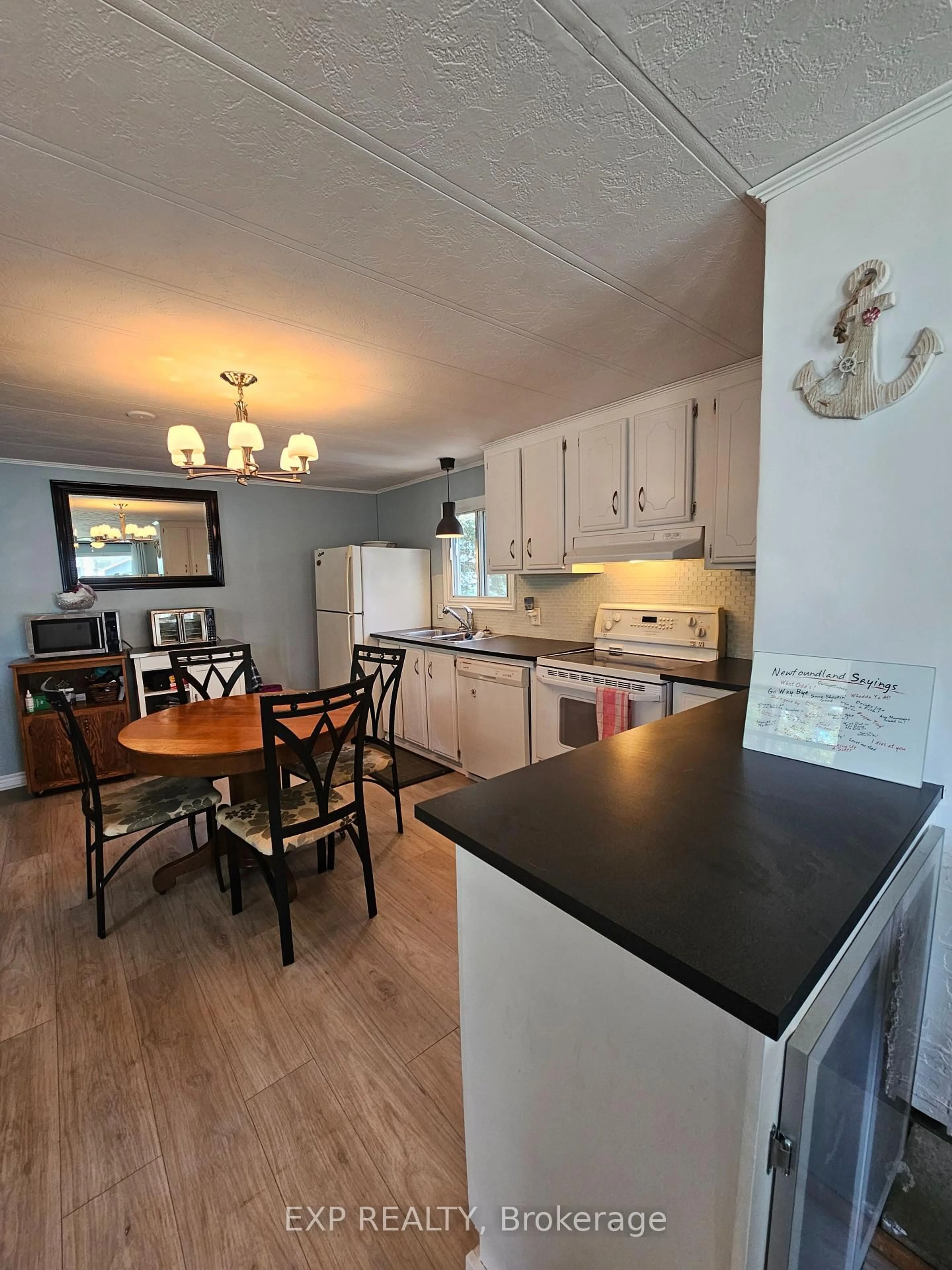 Open concept kitchen, wood/laminate floor for 108 Hutt Rd, Augusta Ontario K6V 5T2