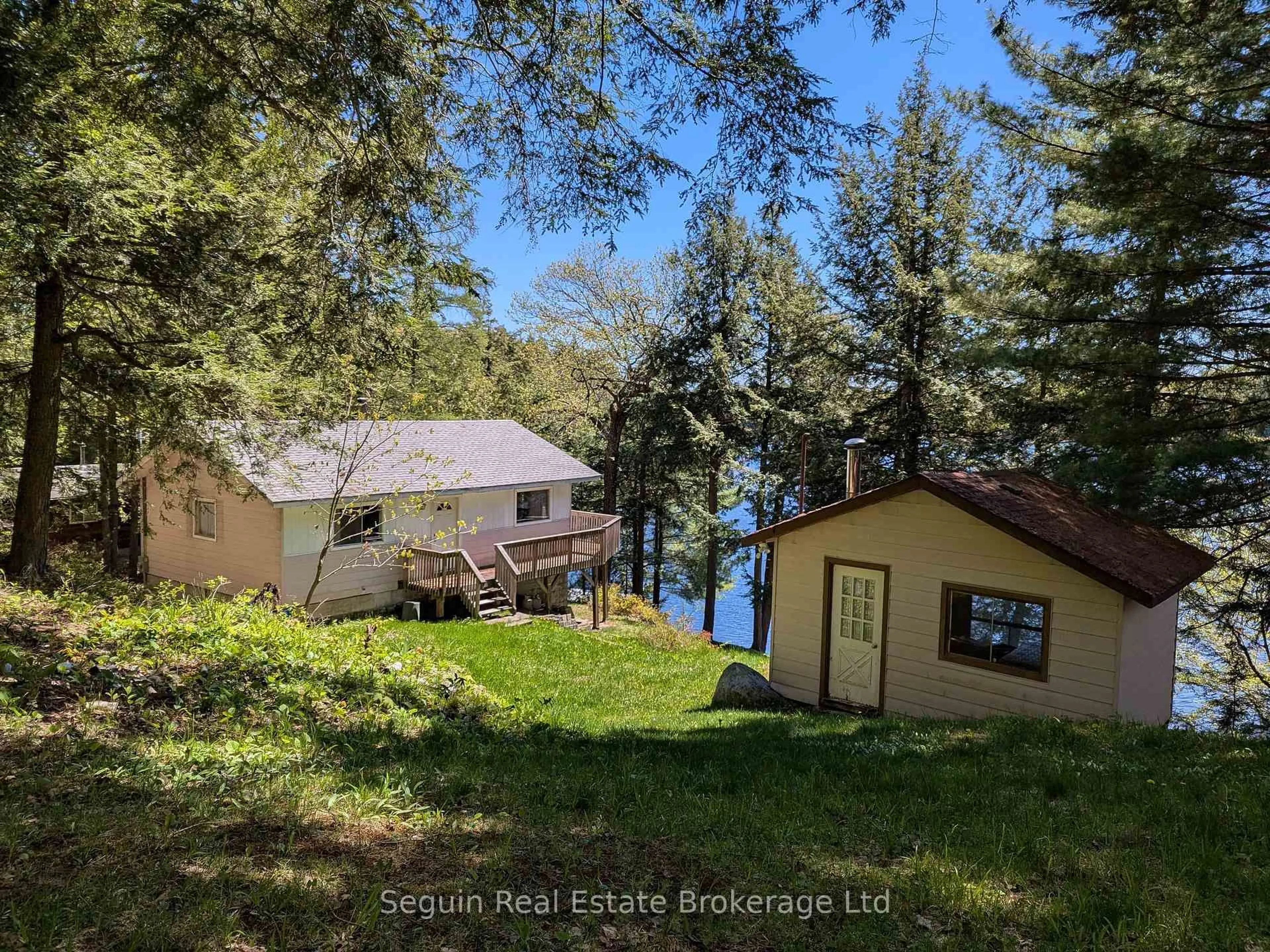 A pic from outside/outdoor area/front of a property/back of a property/a pic from drone, water/lake/river/ocean view for 24 South Fork Rd, The Archipelago Ontario P2A 0B7