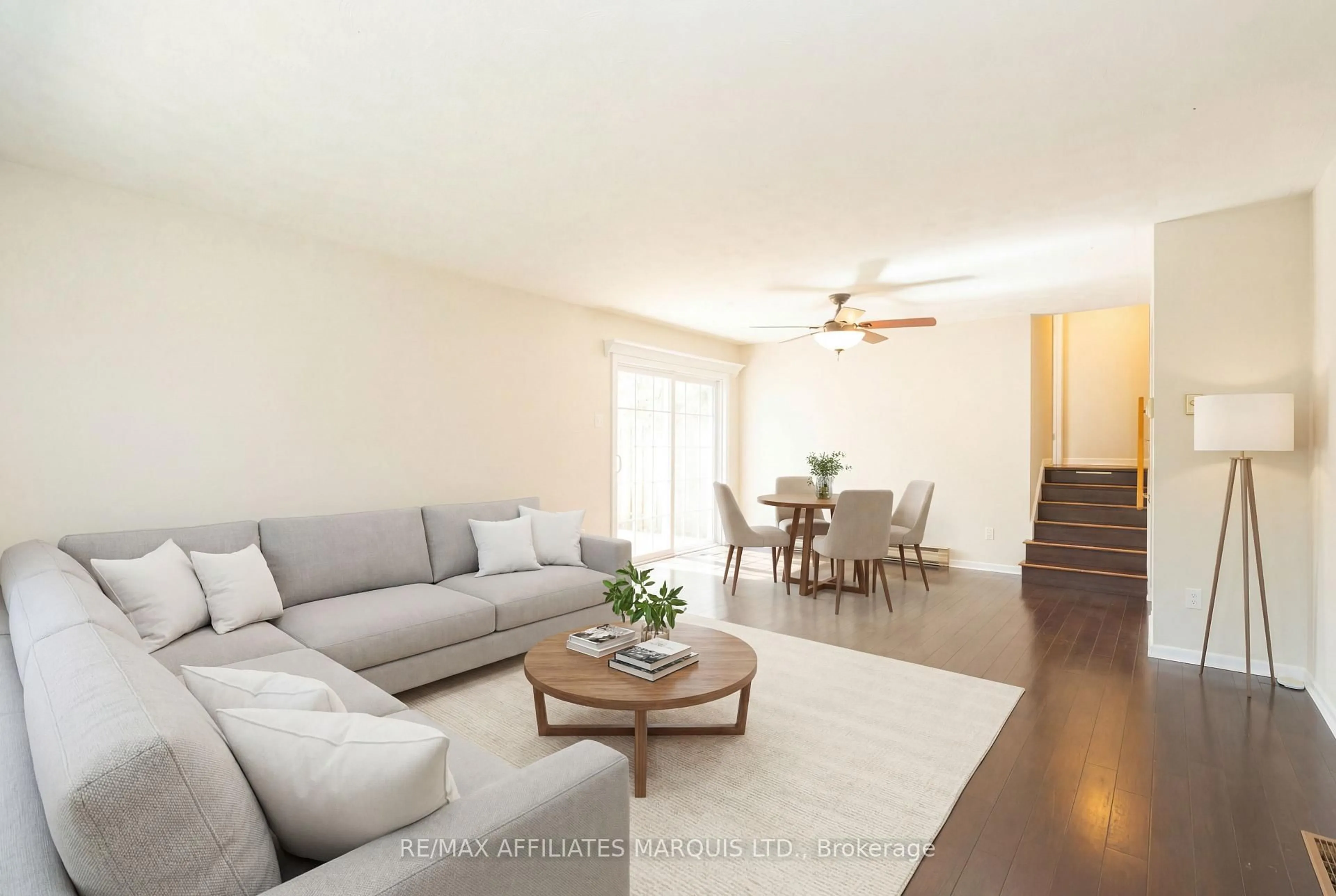 Living room with furniture, wood/laminate floor for 1849 Dewhurst Ave, Cornwall Ontario K6J 3N1