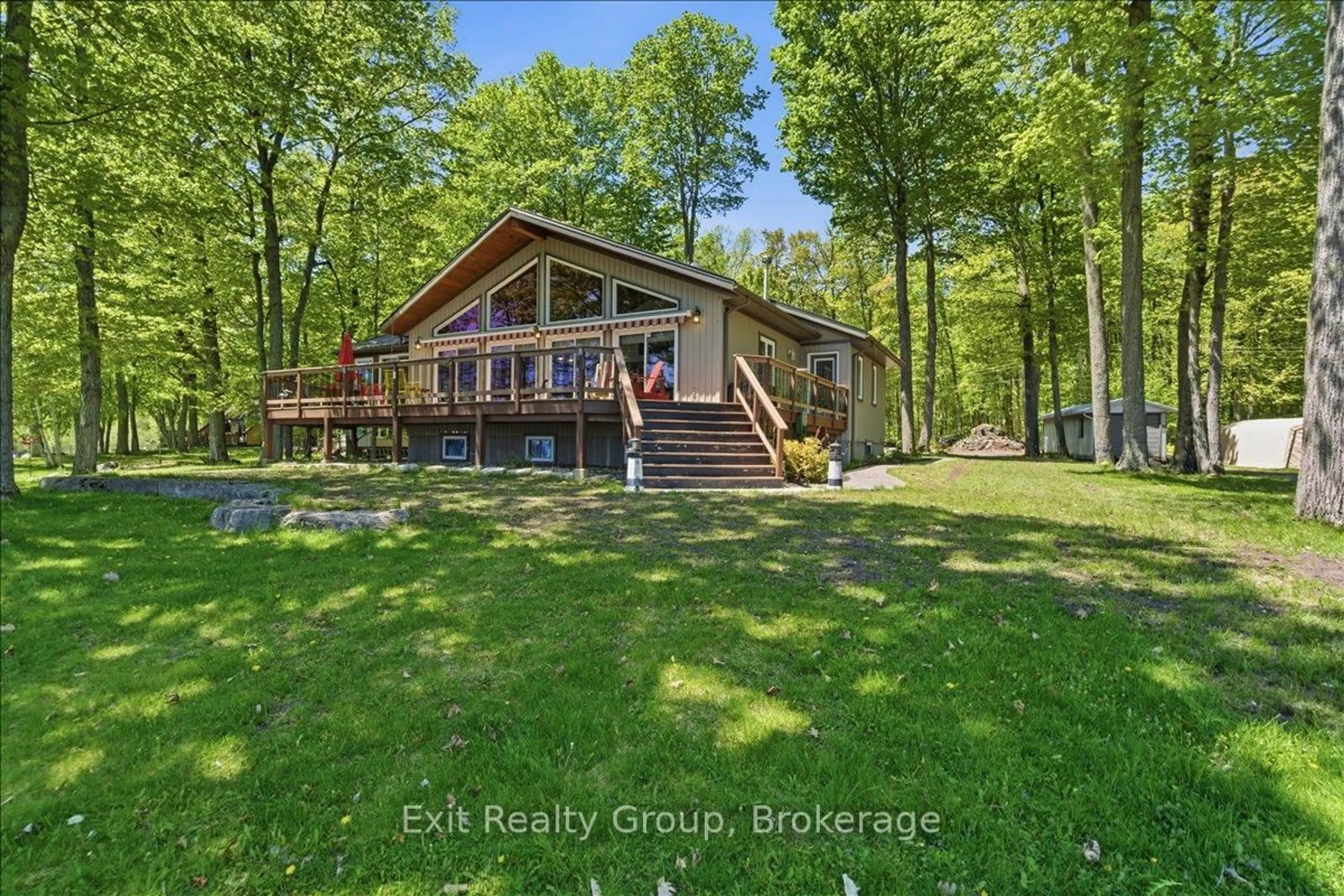 A pic from outside/outdoor area/front of a property/back of a property/a pic from drone, water/lake/river/ocean view for 919 Cook Rd, Limoges Ontario K0K 2M0