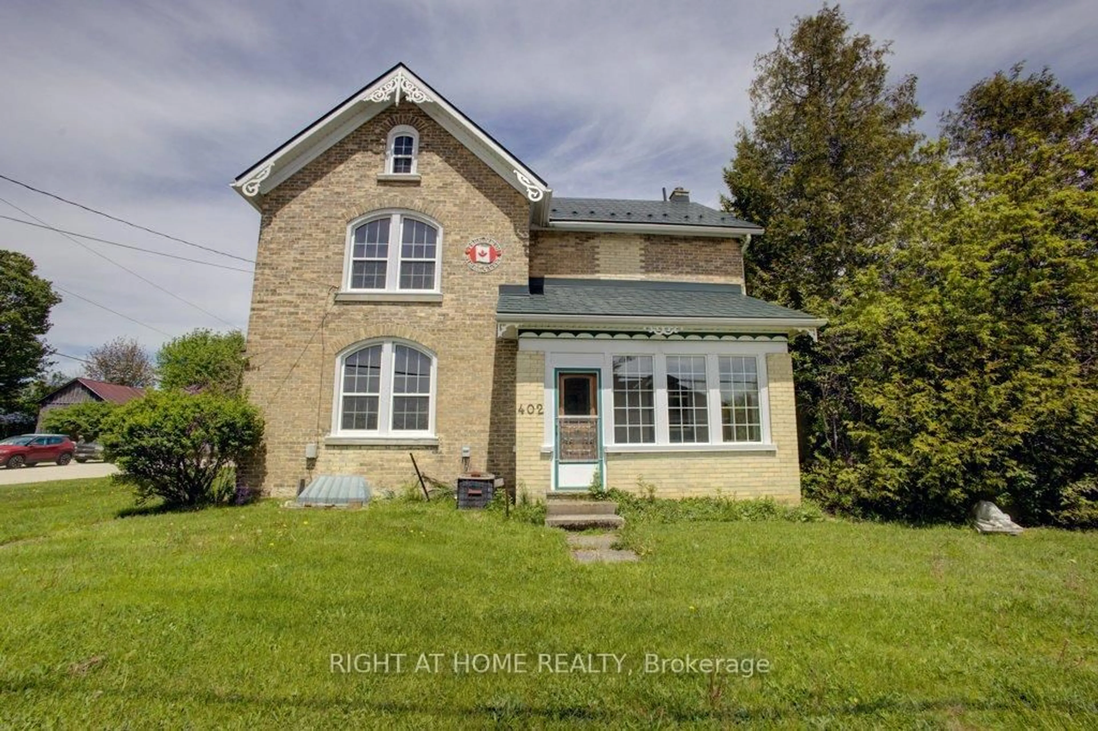 A pic from outside/outdoor area/front of a property/back of a property/a pic from drone, building for 402 Lambton St, West Grey Ontario N0G 1R0