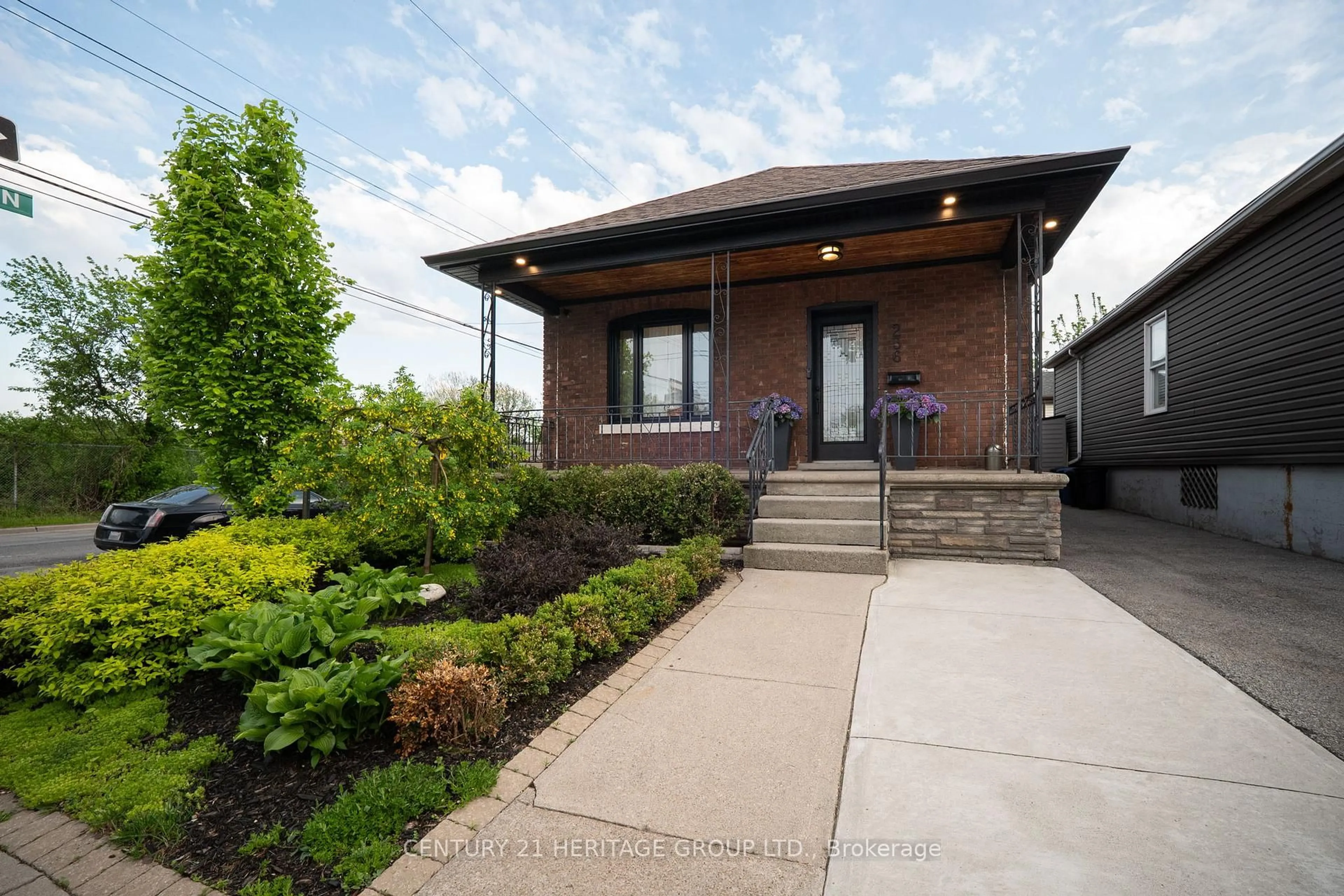 Home with brick exterior material, street for 236 Macaulay St, Hamilton Ontario L8L 3X8