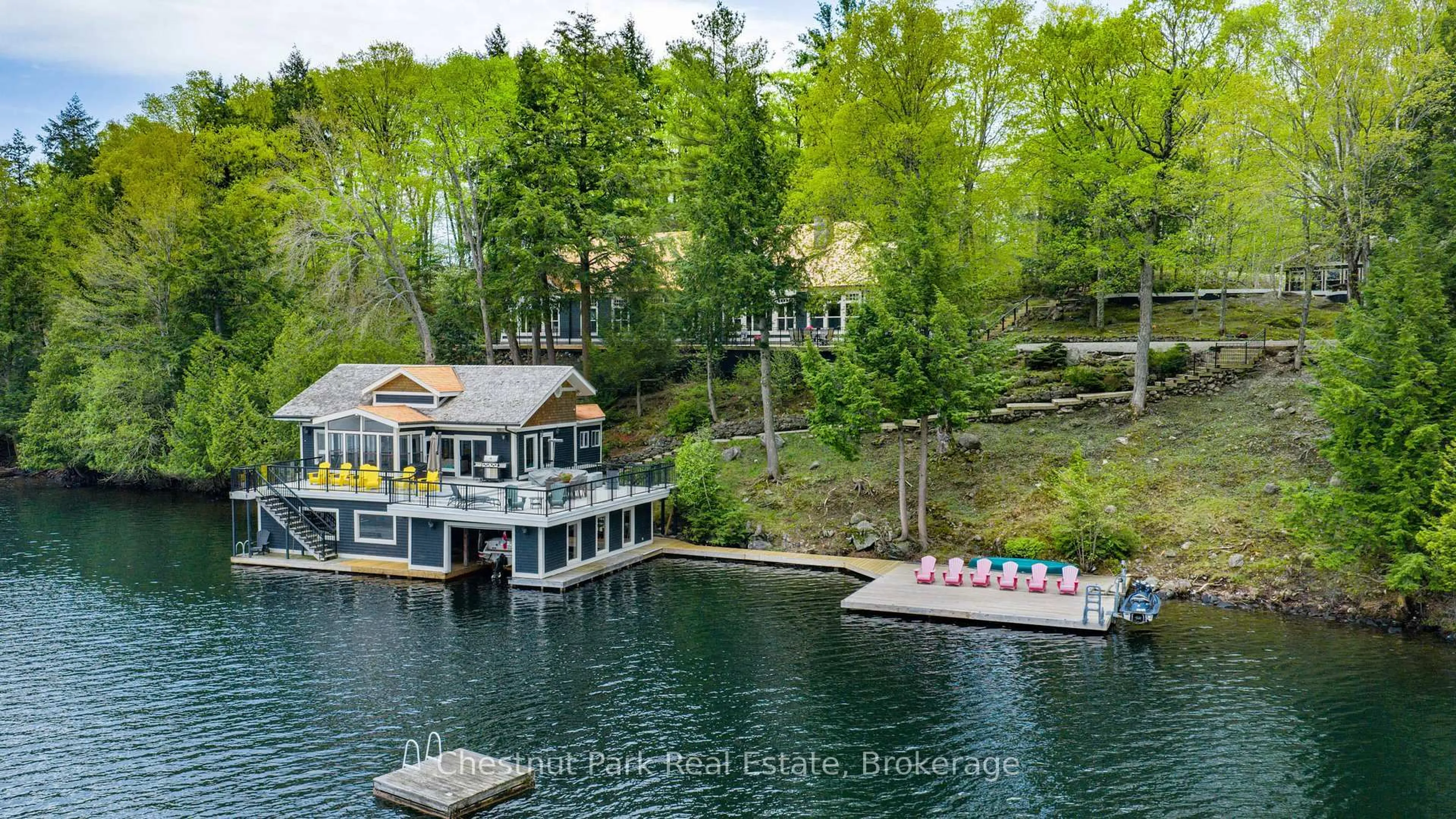 A pic from outside/outdoor area/front of a property/back of a property/a pic from drone, water/lake/river/ocean view for 1025 Appian Way ##12, Muskoka Lakes Ontario P0B 1J0