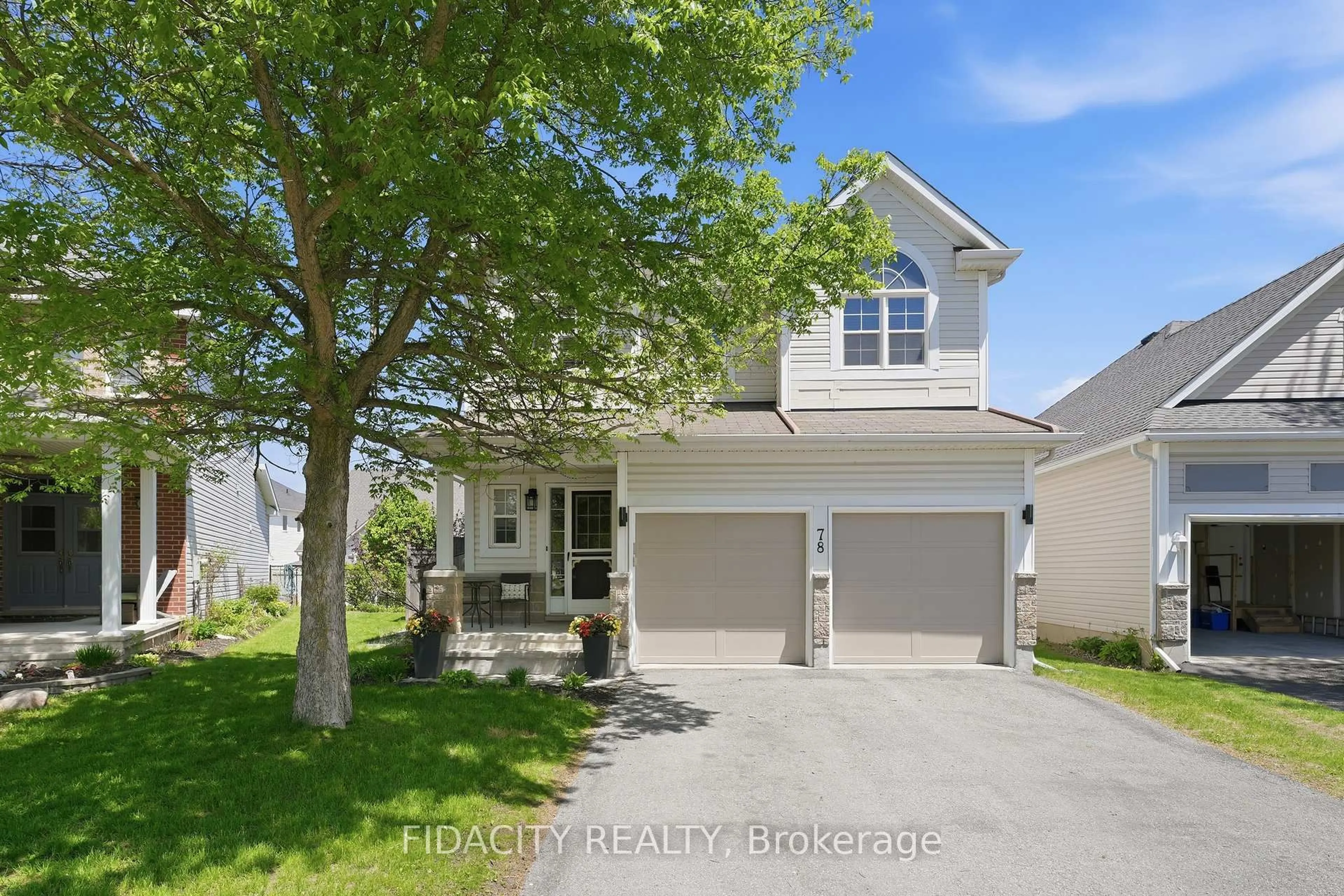 A pic from outside/outdoor area/front of a property/back of a property/a pic from drone, street for 78 Black Bear Way, Stittsville Ontario K2S 2G7