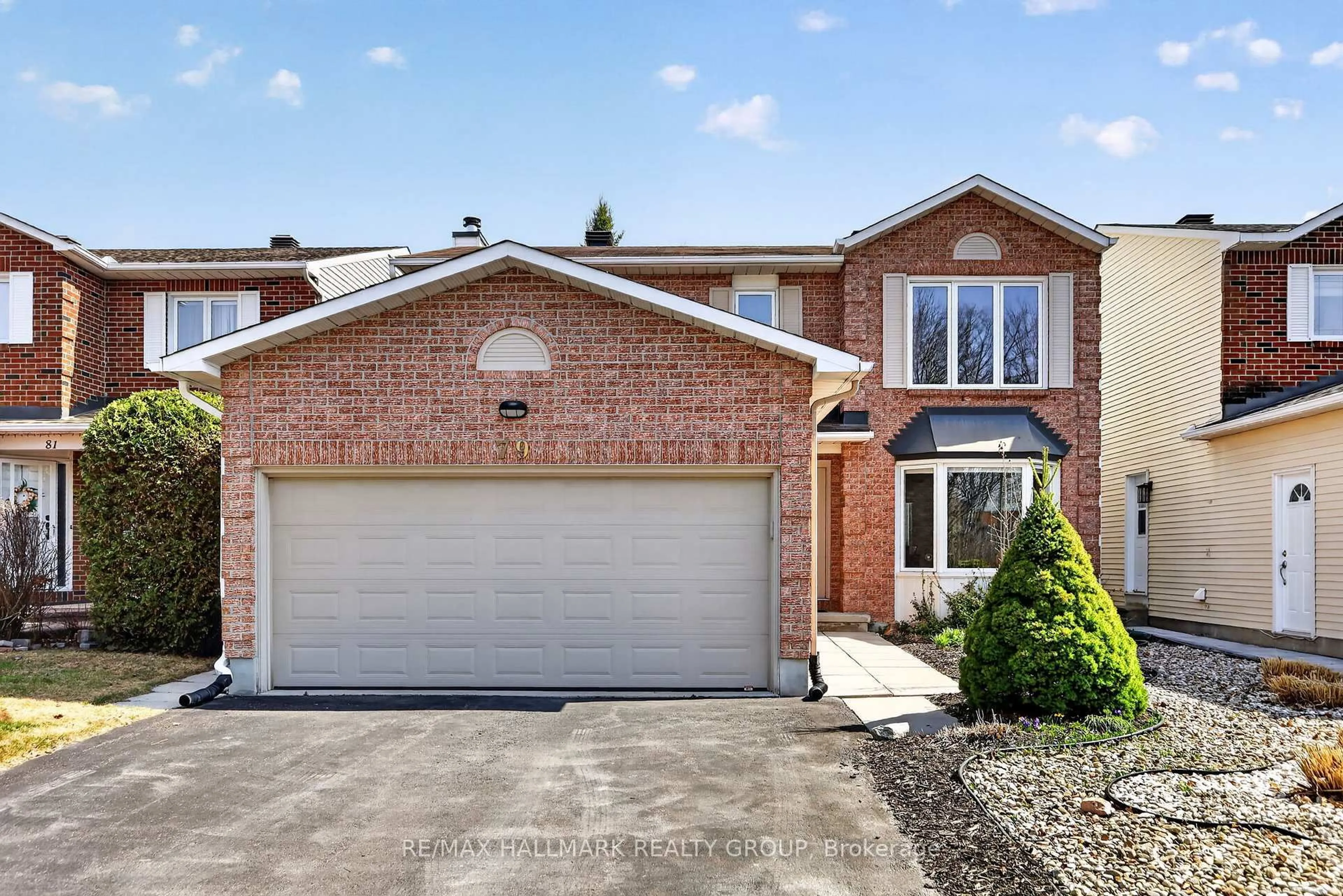 Home with brick exterior material, street for 79 Dossetter Way, Ottawa Ontario K1G 4S7