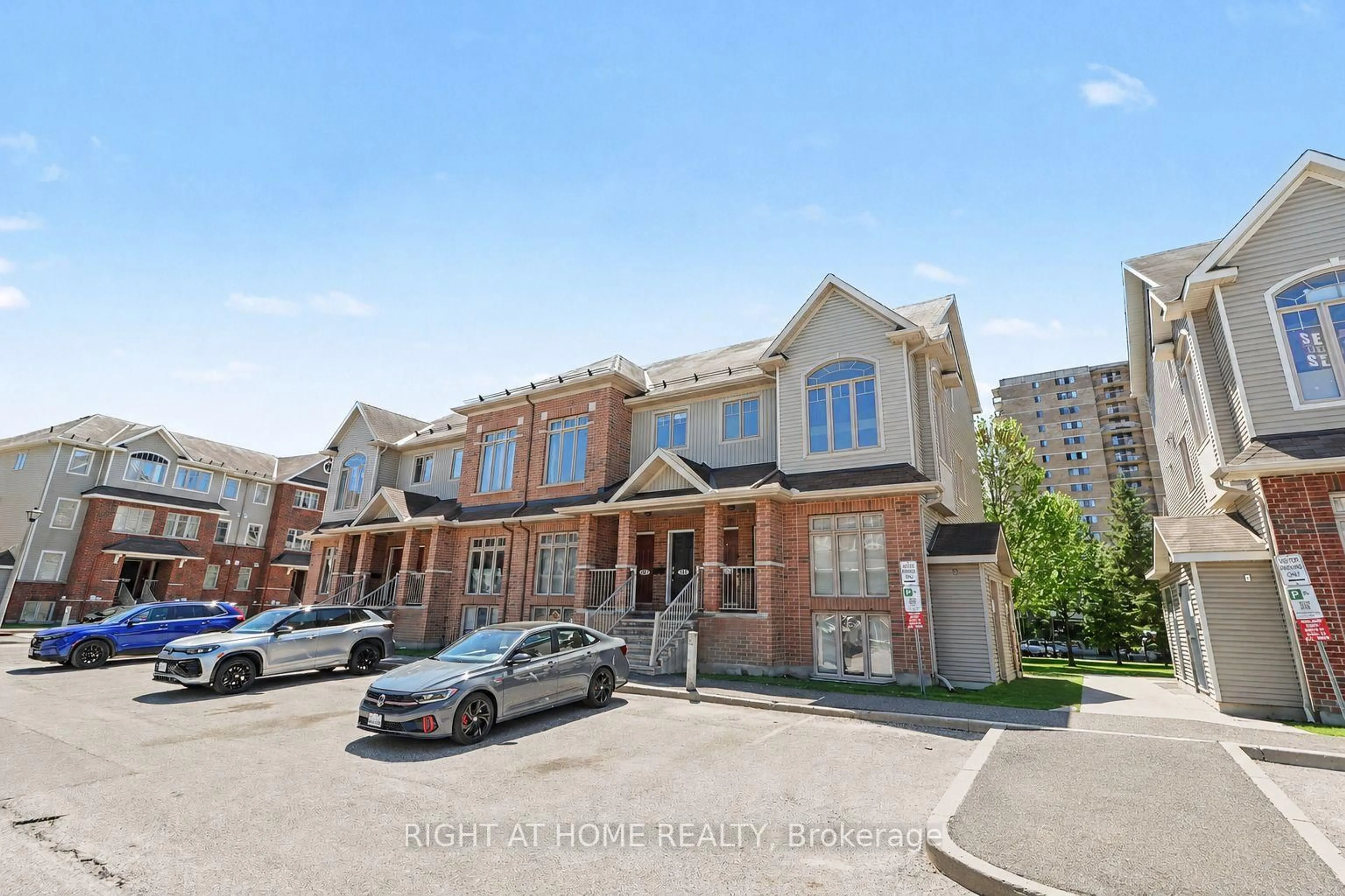 A pic from outside/outdoor area/front of a property/back of a property/a pic from drone, street for 572 Reardon Private #7, Ottawa Ontario K1V 2K9