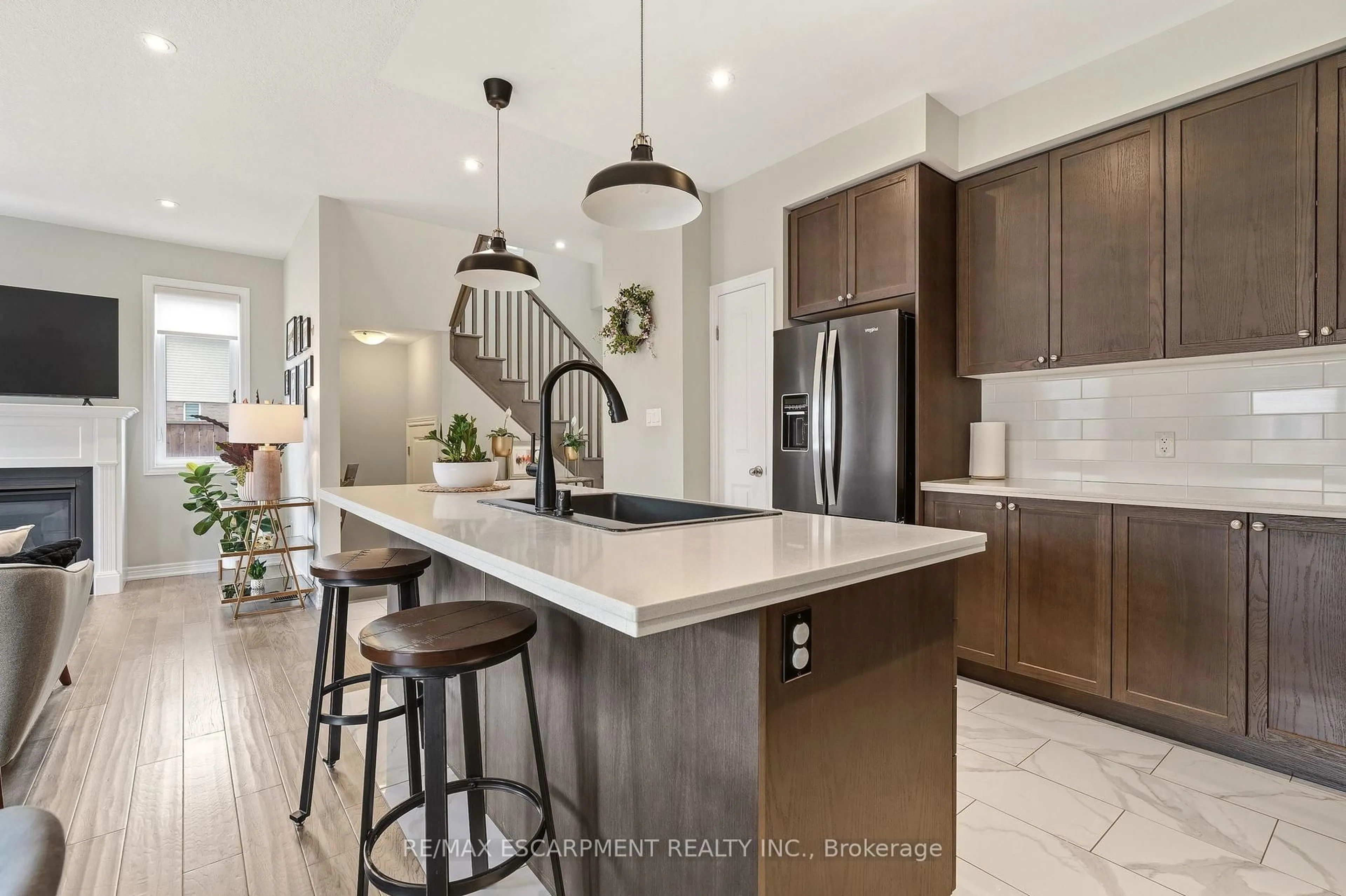 Open concept kitchen, ceramic/tile floor for 131 Sonoma Lane, Hamilton Ontario L8E 0J9