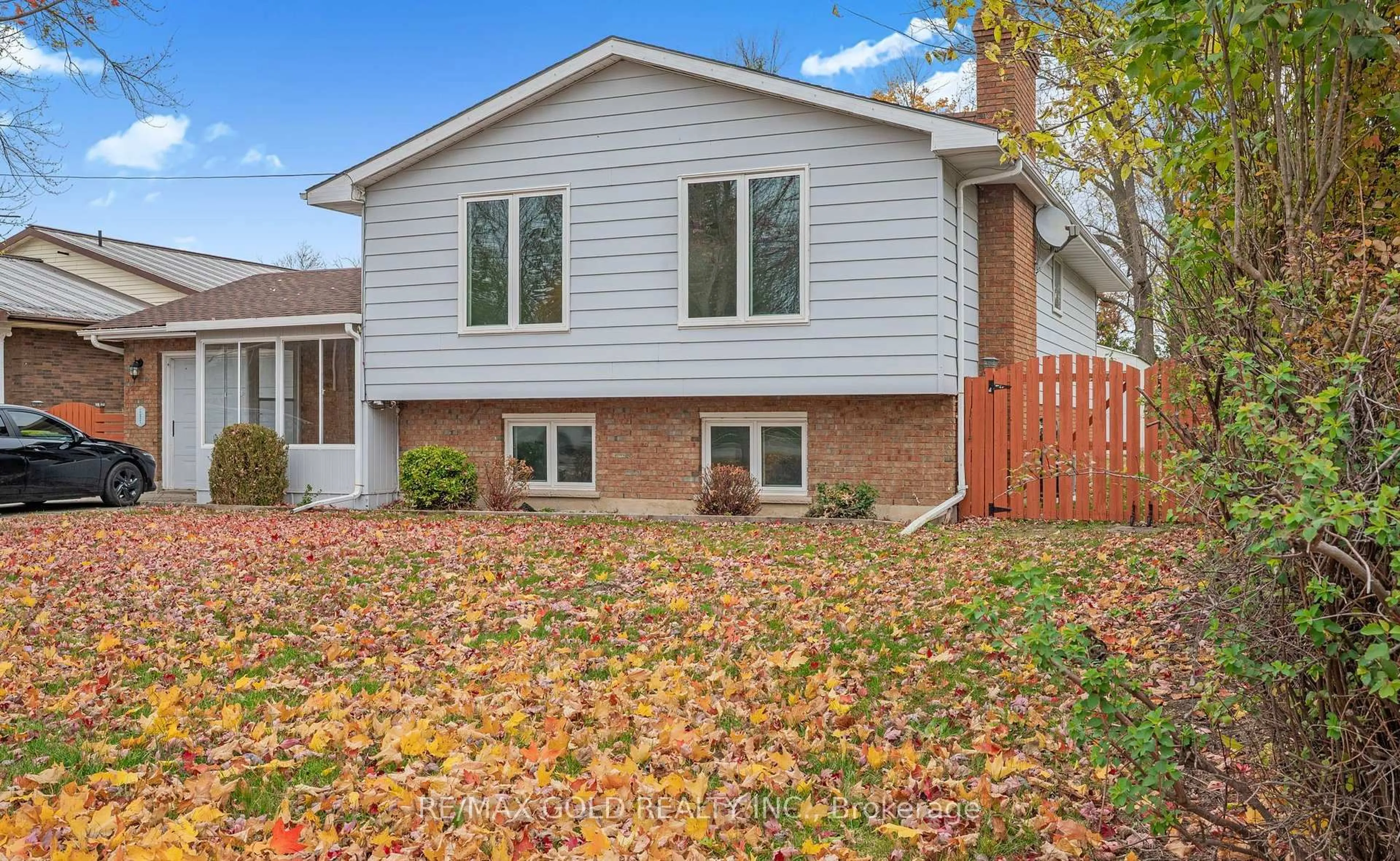 Home with vinyl exterior material, street for 21990 Hagerty Rd, Southwest Middlesex Ontario N0L 2N0