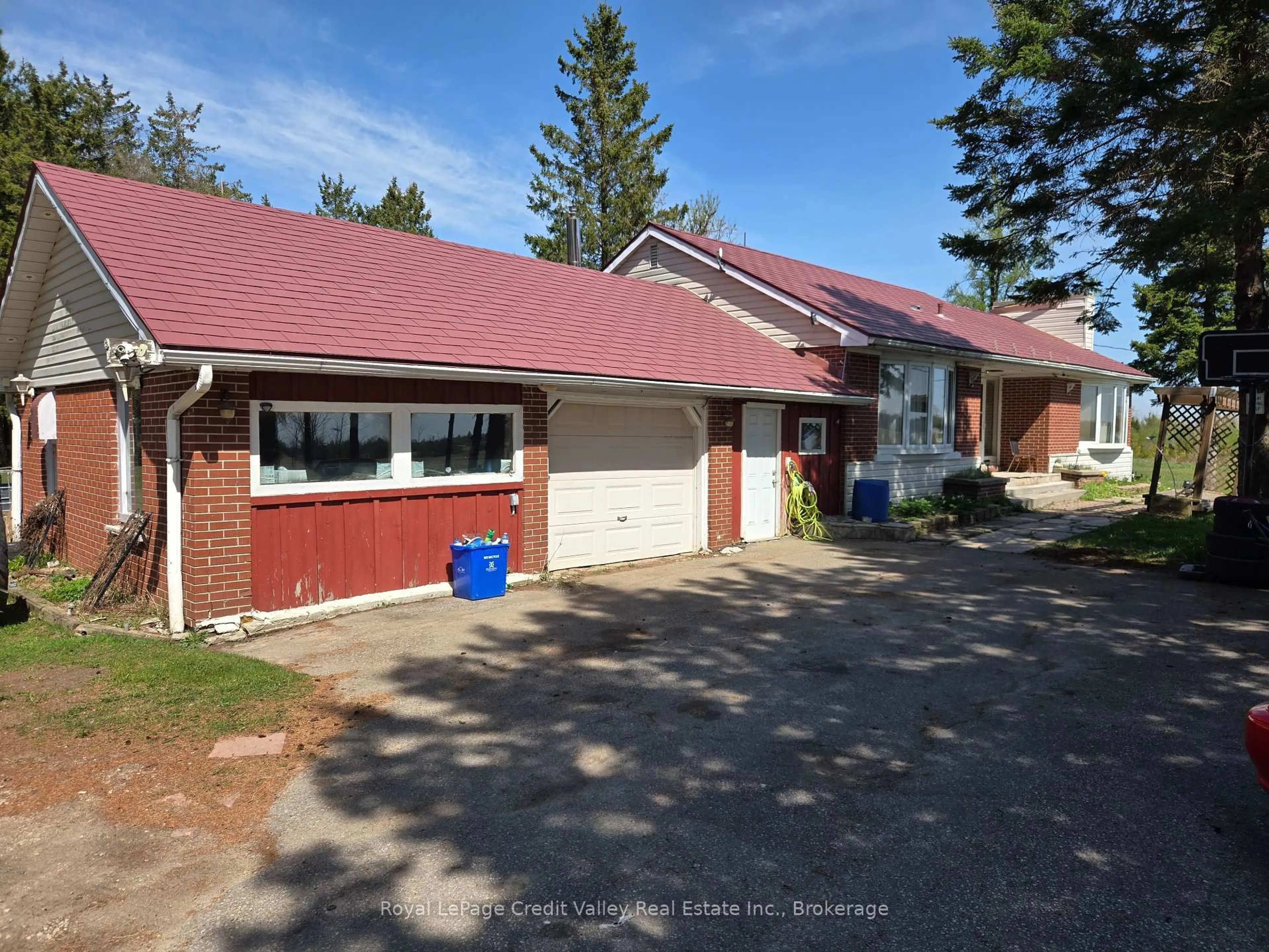 A pic from outside/outdoor area/front of a property/back of a property/a pic from drone, street for 159123 Highway 10, Melancthon Ontario L9V 2G3