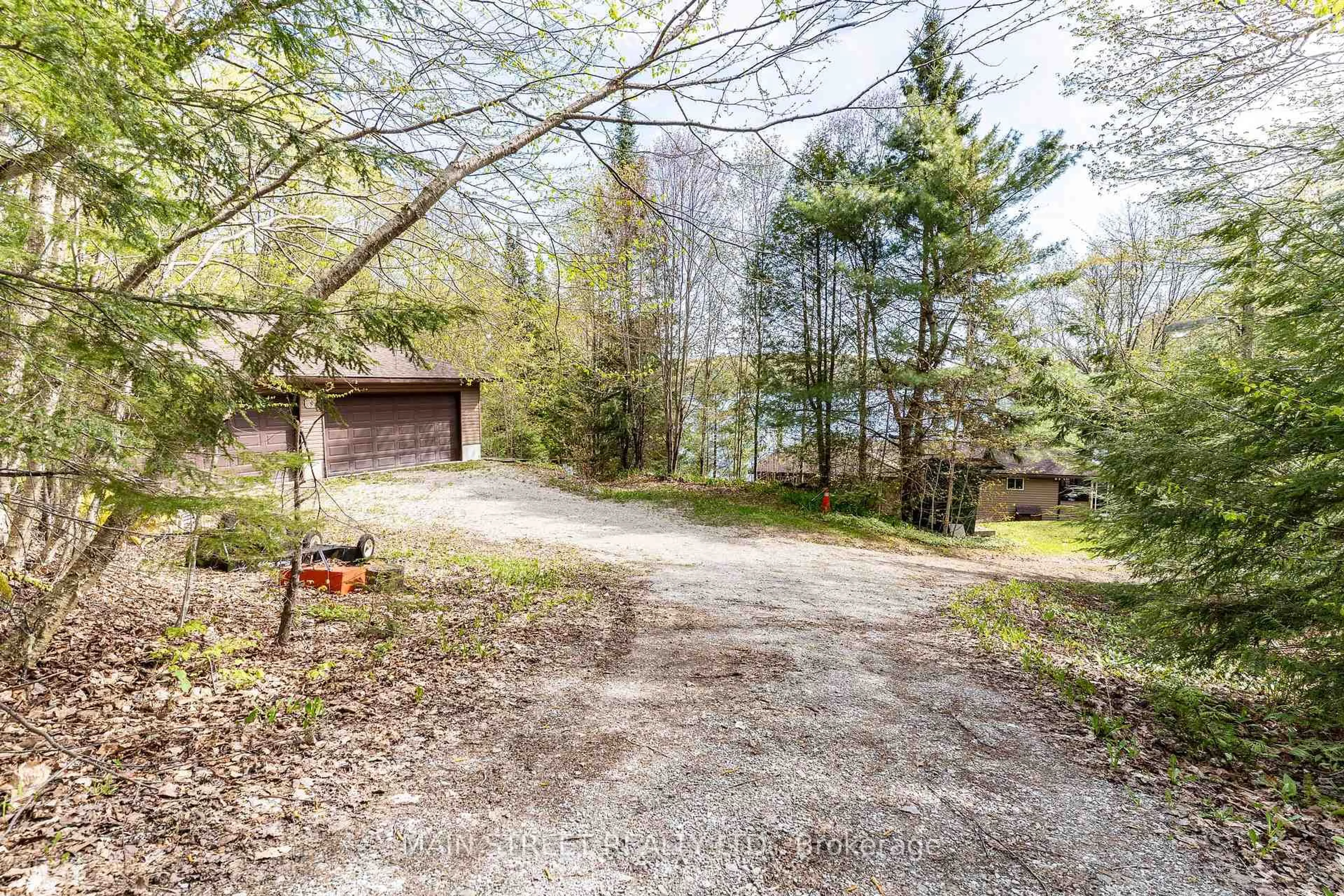 A pic from outside/outdoor area/front of a property/back of a property/a pic from drone, forest/trees view for 1146 Farmer Hays Dr, Algonquin Highlands Ontario P0A 1E0