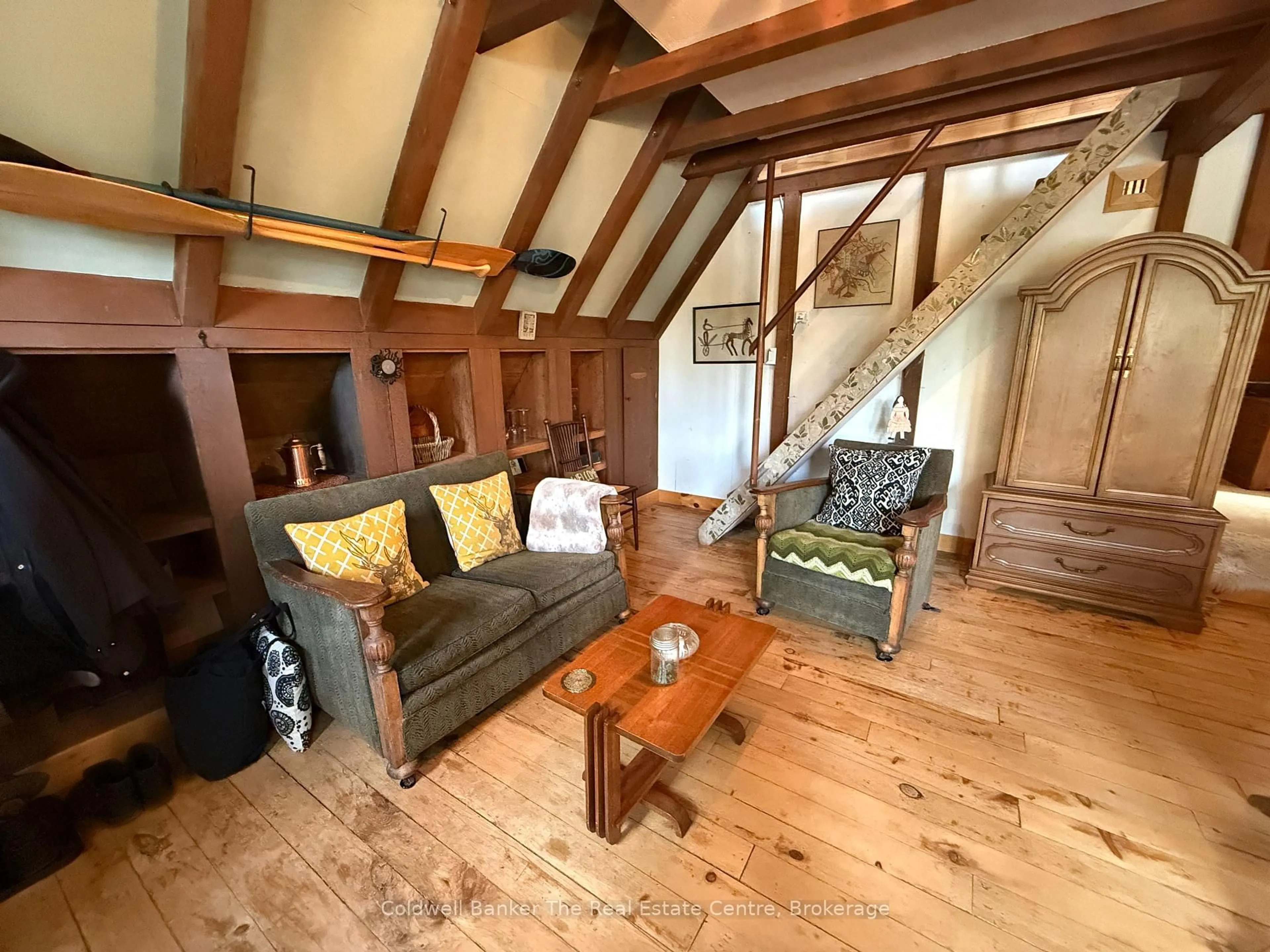 Living room with furniture, wood/laminate floor for 156 River Rd, Joly Ontario P0A 1X0