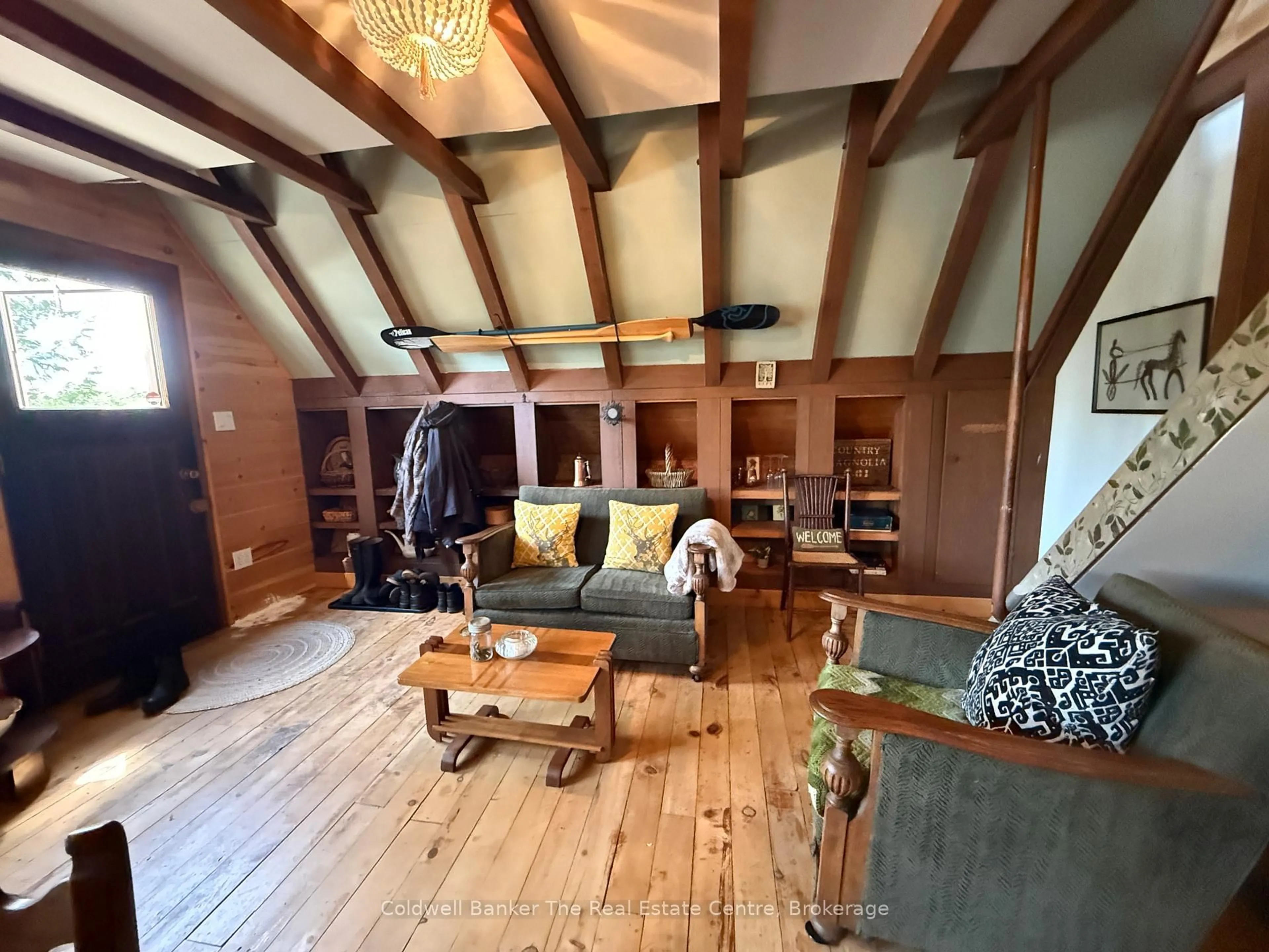 Living room with furniture, wood/laminate floor for 156 River Rd, Joly Ontario P0A 1X0