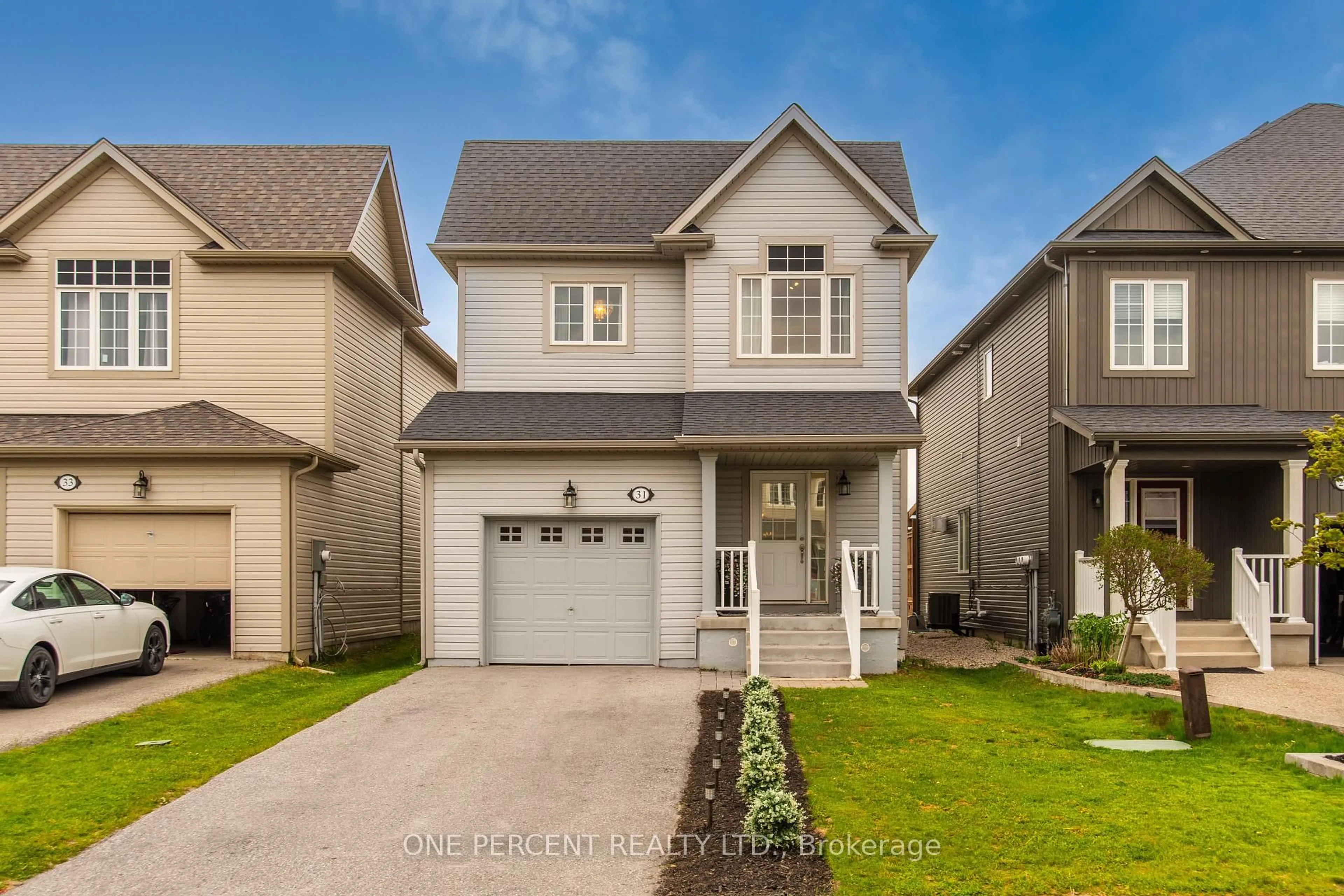 Home with vinyl exterior material, street for 31 Courtney St, Centre Wellington Ontario N1M 0E3