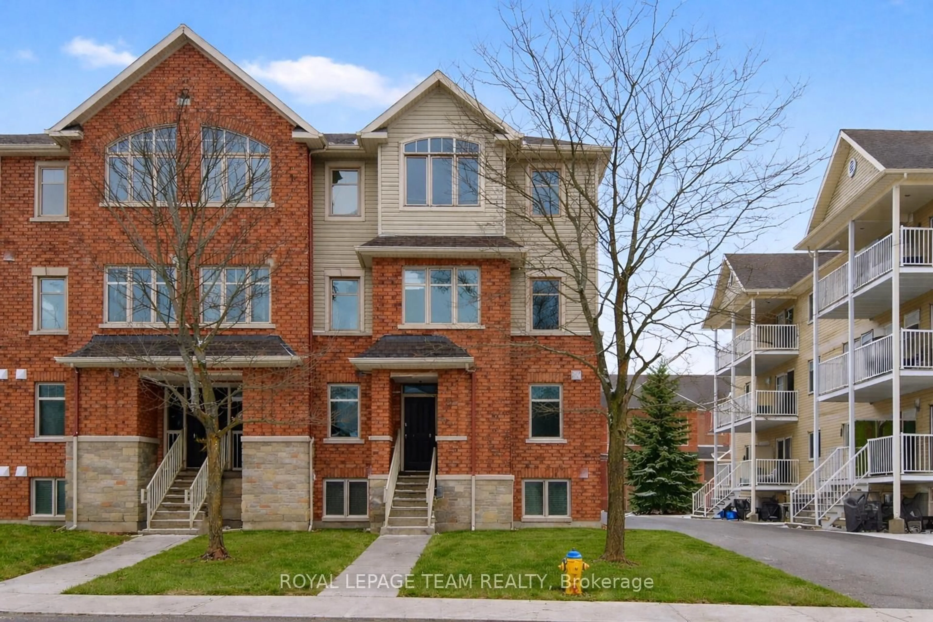 Home with brick exterior material, street for 255 Deercroft Ave, Ottawa Ontario K2J 5J9