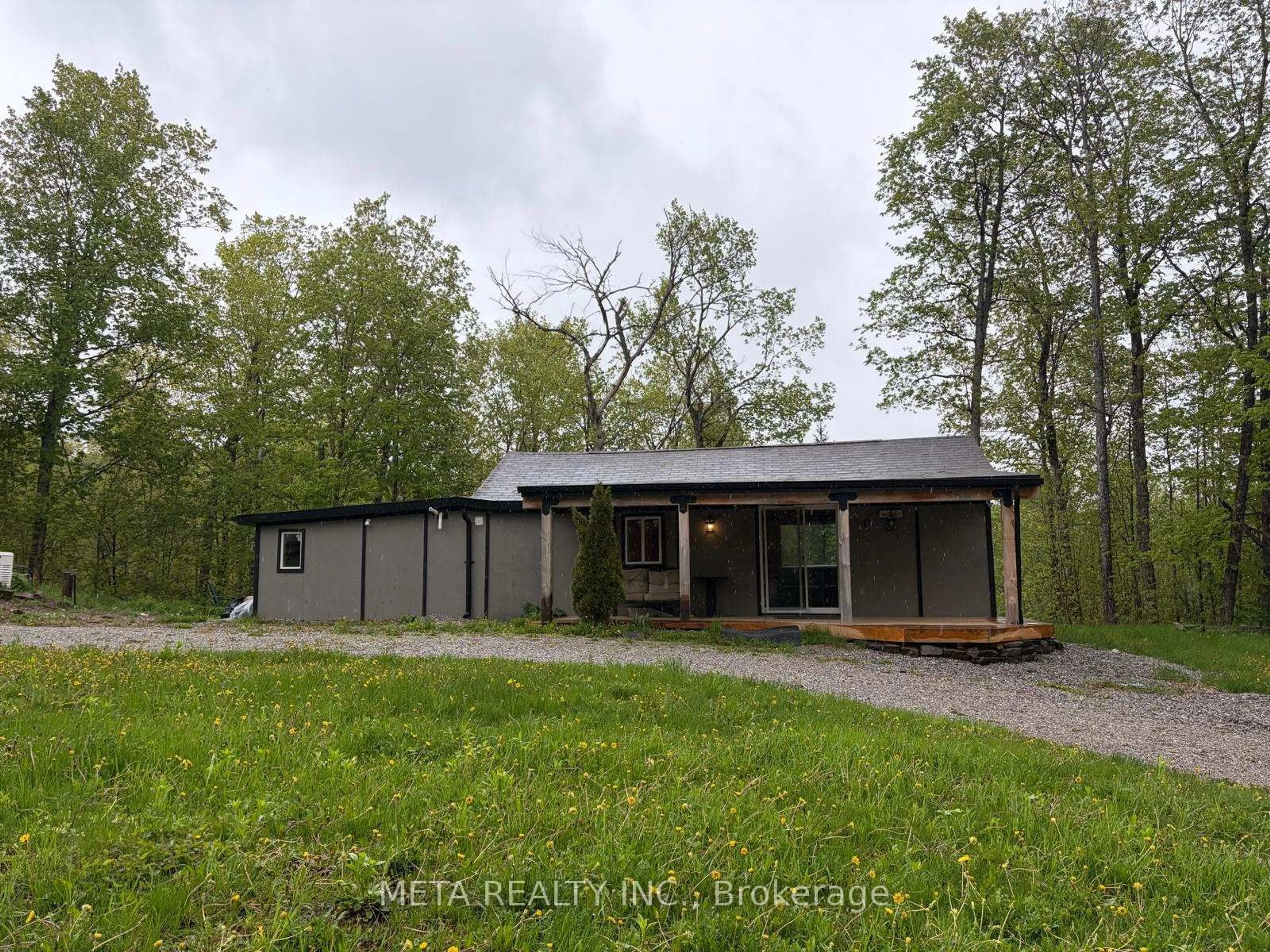 A pic from outside/outdoor area/front of a property/back of a property/a pic from drone, unknown for 106 Boundary Lane, Trent Lakes Ontario K0M 2A0