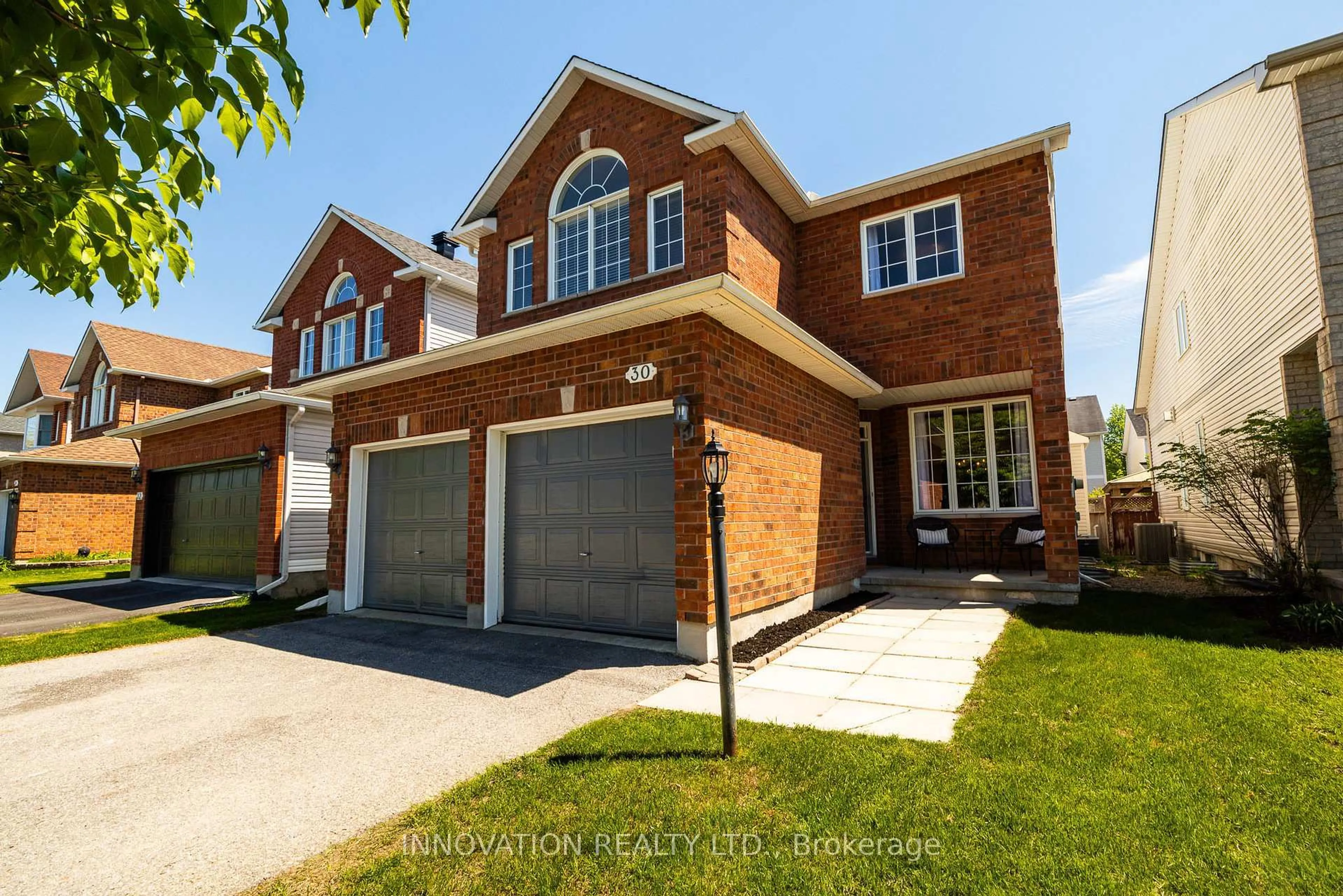 Home with brick exterior material, street for 30 Mountain Ash Dr, Ottawa Ontario K2G 6R3