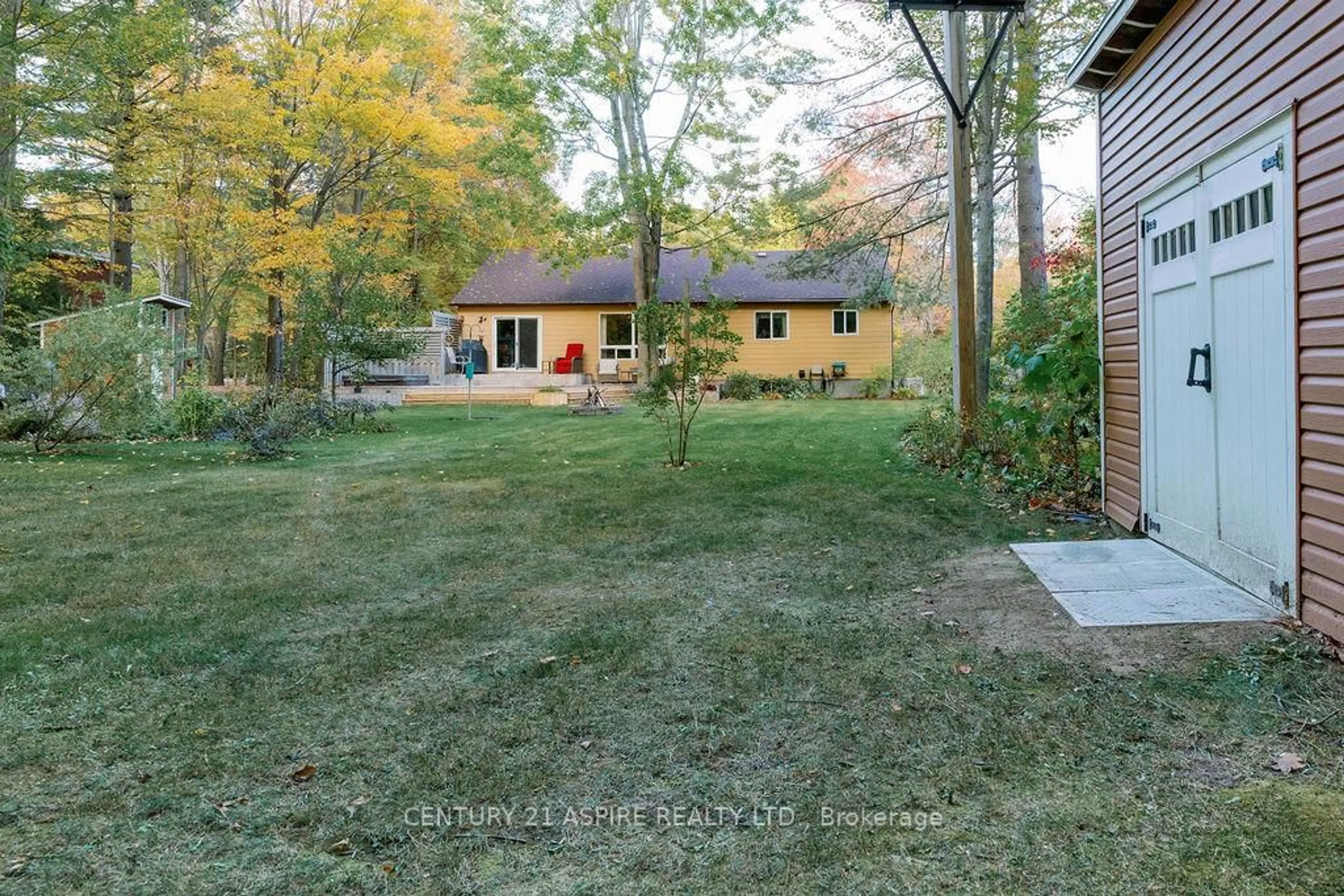 A pic from outside/outdoor area/front of a property/back of a property/a pic from drone, forest/trees view for 32 Country Lane, Petawawa Ontario K8H 3J9