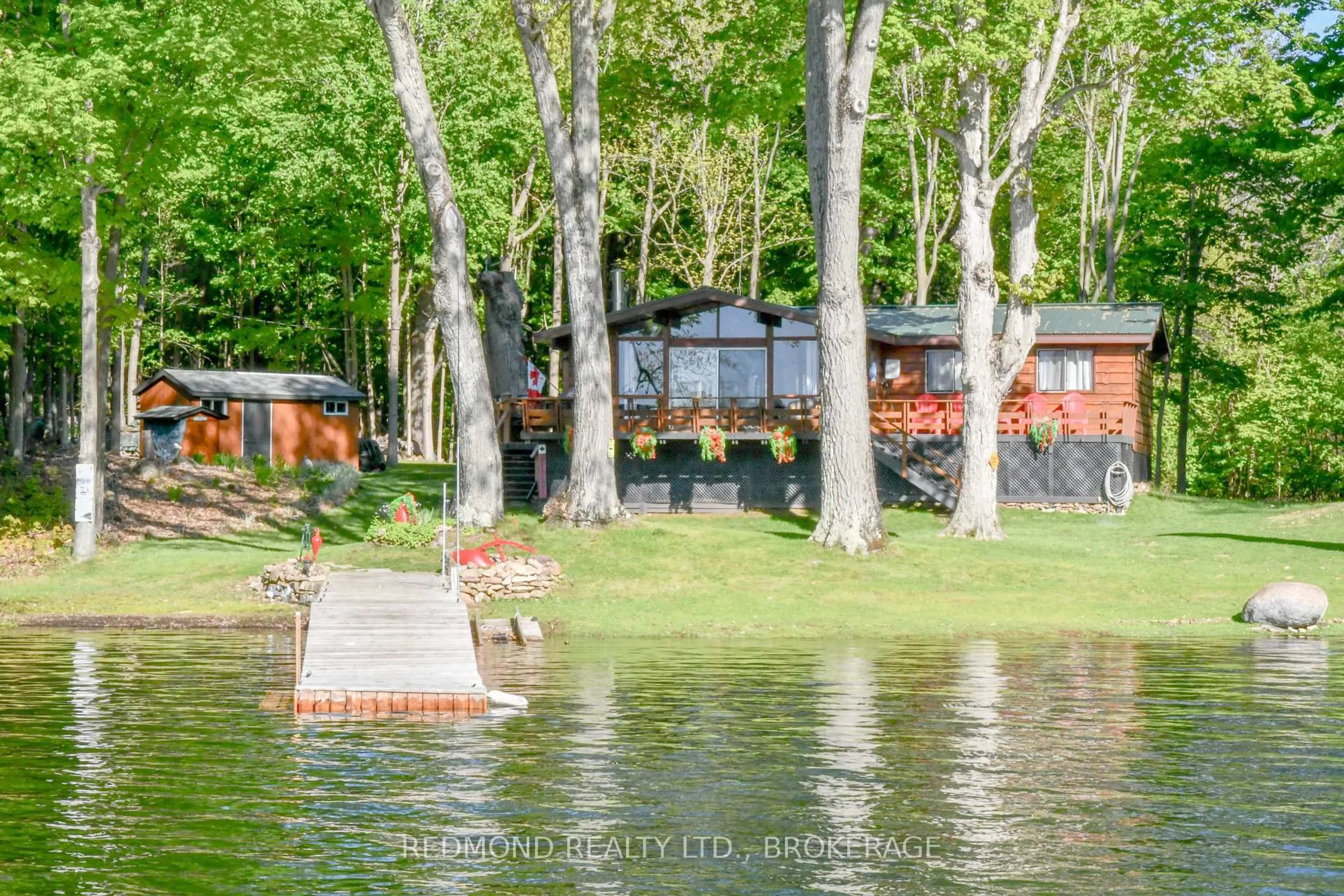 A pic from outside/outdoor area/front of a property/back of a property/a pic from drone, water/lake/river/ocean view for 4 Tremont Park Island, Frontenac Islands Ontario K7G 3C9