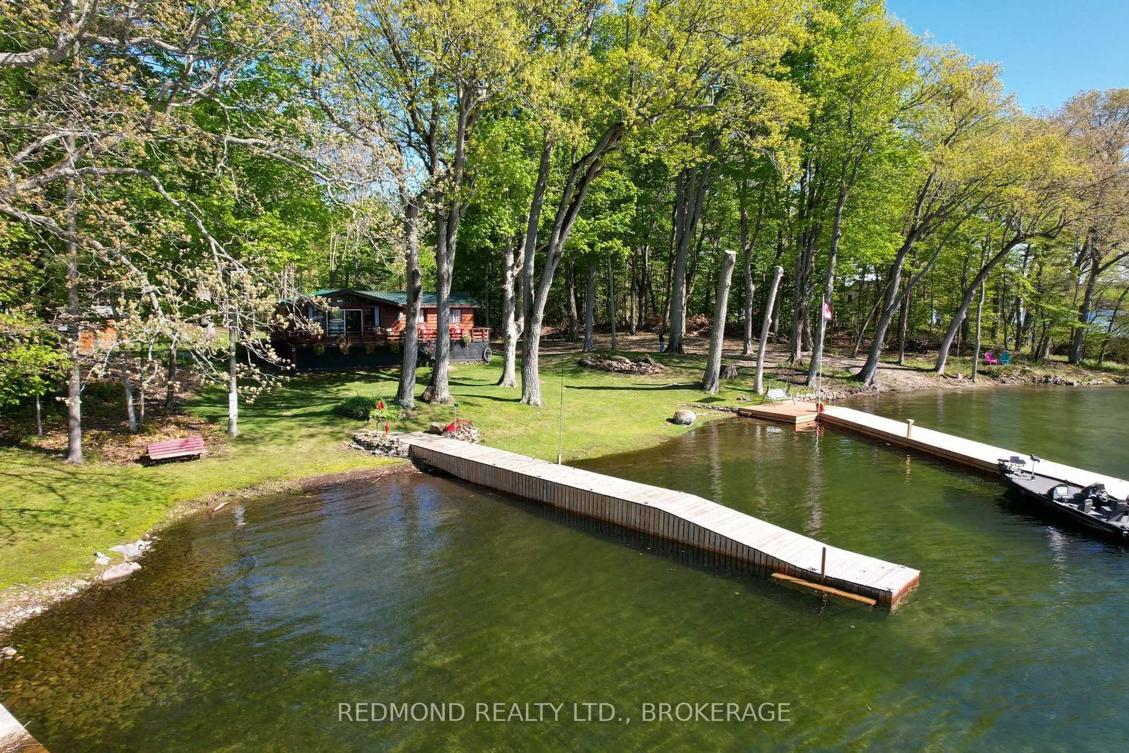 A pic from outside/outdoor area/front of a property/back of a property/a pic from drone, water/lake/river/ocean view for 4 Tremont Park Island, Frontenac Islands Ontario K7G 3C9