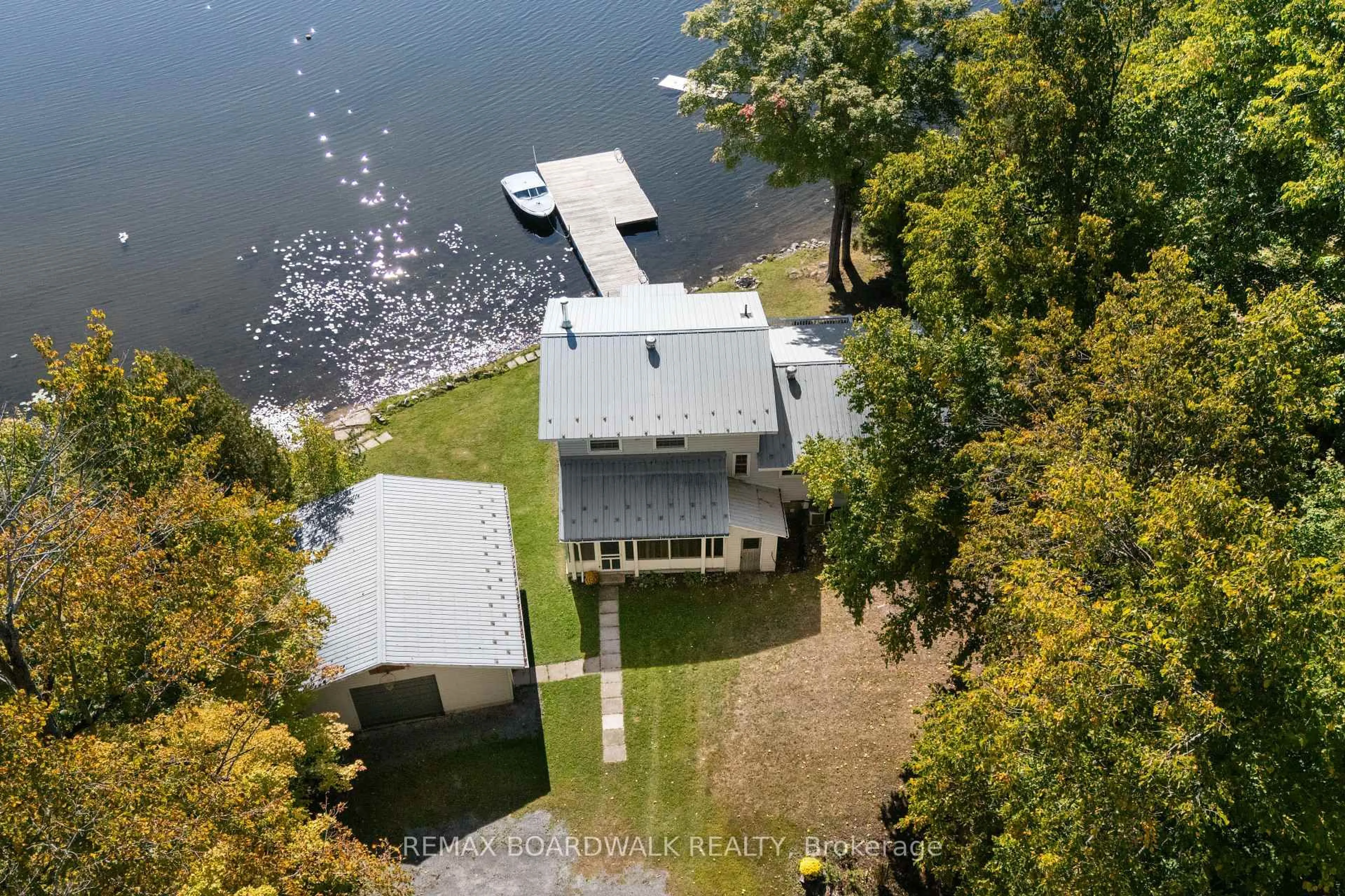 A pic from outside/outdoor area/front of a property/back of a property/a pic from drone, water/lake/river/ocean view for 363 Hardwood Ridge Rd, Lanark Ontario K0G 1K0