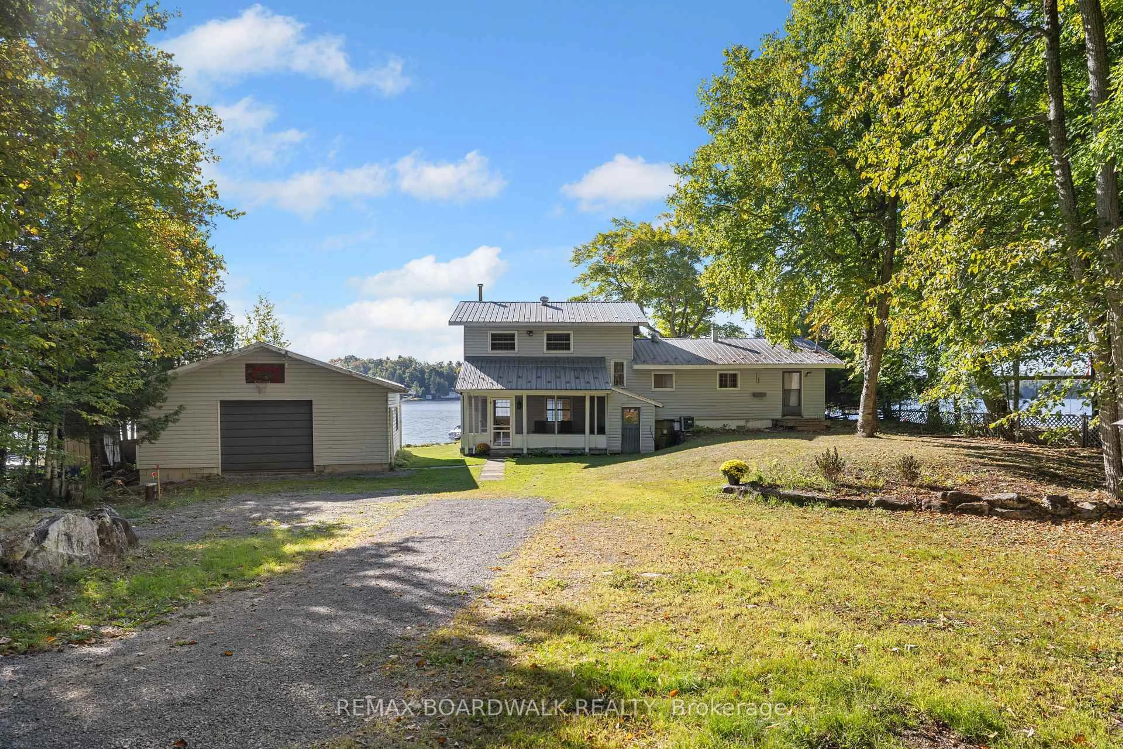 A pic from outside/outdoor area/front of a property/back of a property/a pic from drone, water/lake/river/ocean view for 363 Hardwood Ridge Rd, Lanark Ontario K0G 1K0