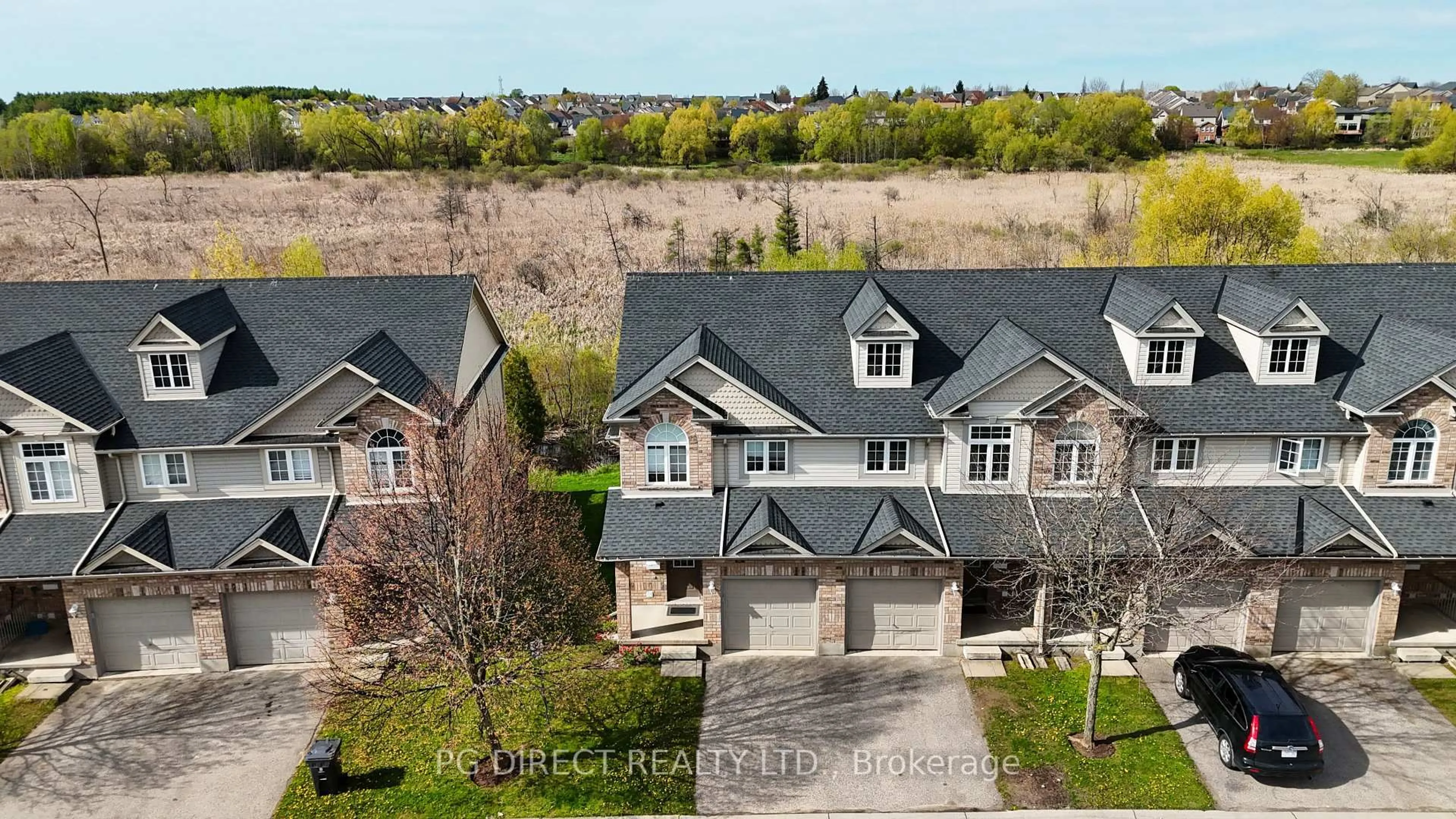 A pic from outside/outdoor area/front of a property/back of a property/a pic from drone, unknown for 1155 Gordon St #31, Guelph Ontario N1L 1S8