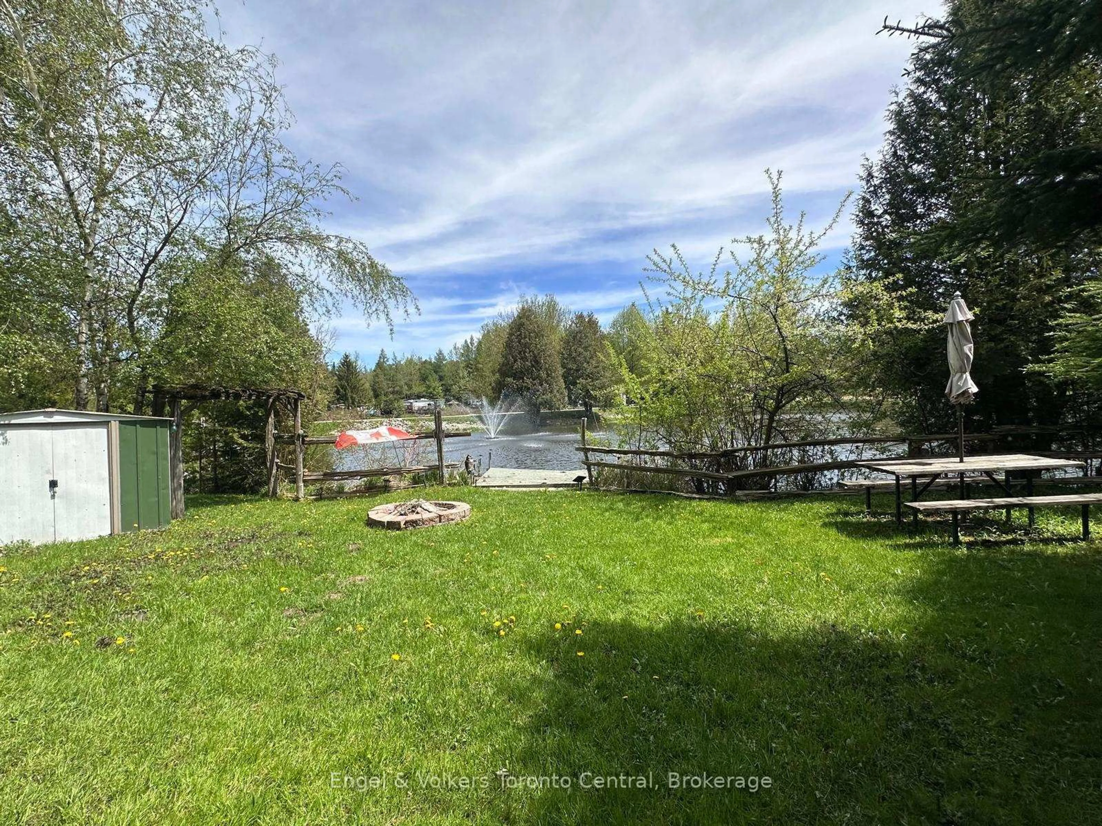 A pic from outside/outdoor area/front of a property/back of a property/a pic from drone, water/lake/river/ocean view for 7489 SIDEROAD 5 E #E6, Wellington North Ontario N0G 2L0