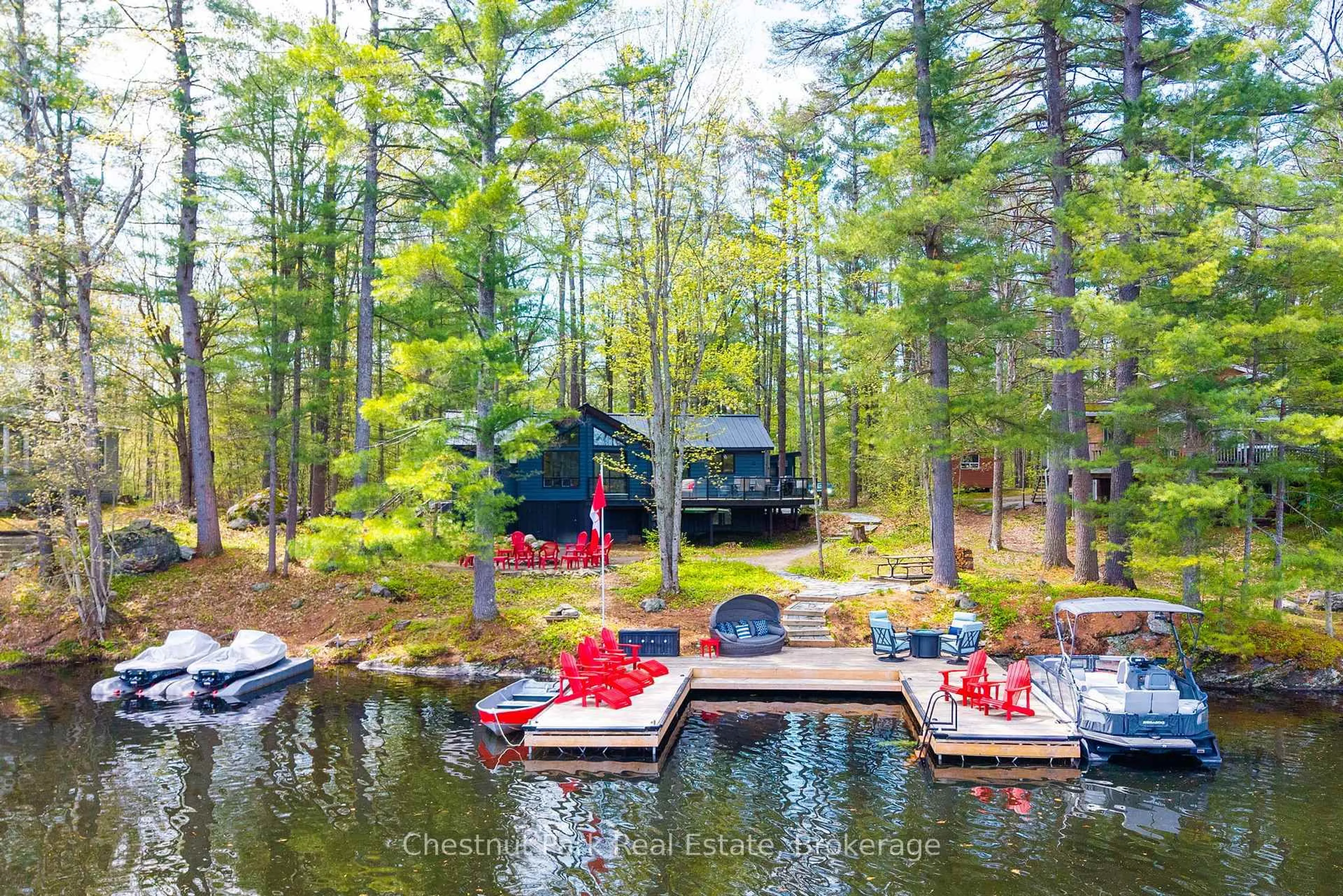 A pic from outside/outdoor area/front of a property/back of a property/a pic from drone, water/lake/river/ocean view for 1117 Turtle Lake Rd, Gravenhurst Ontario P1P 1R2
