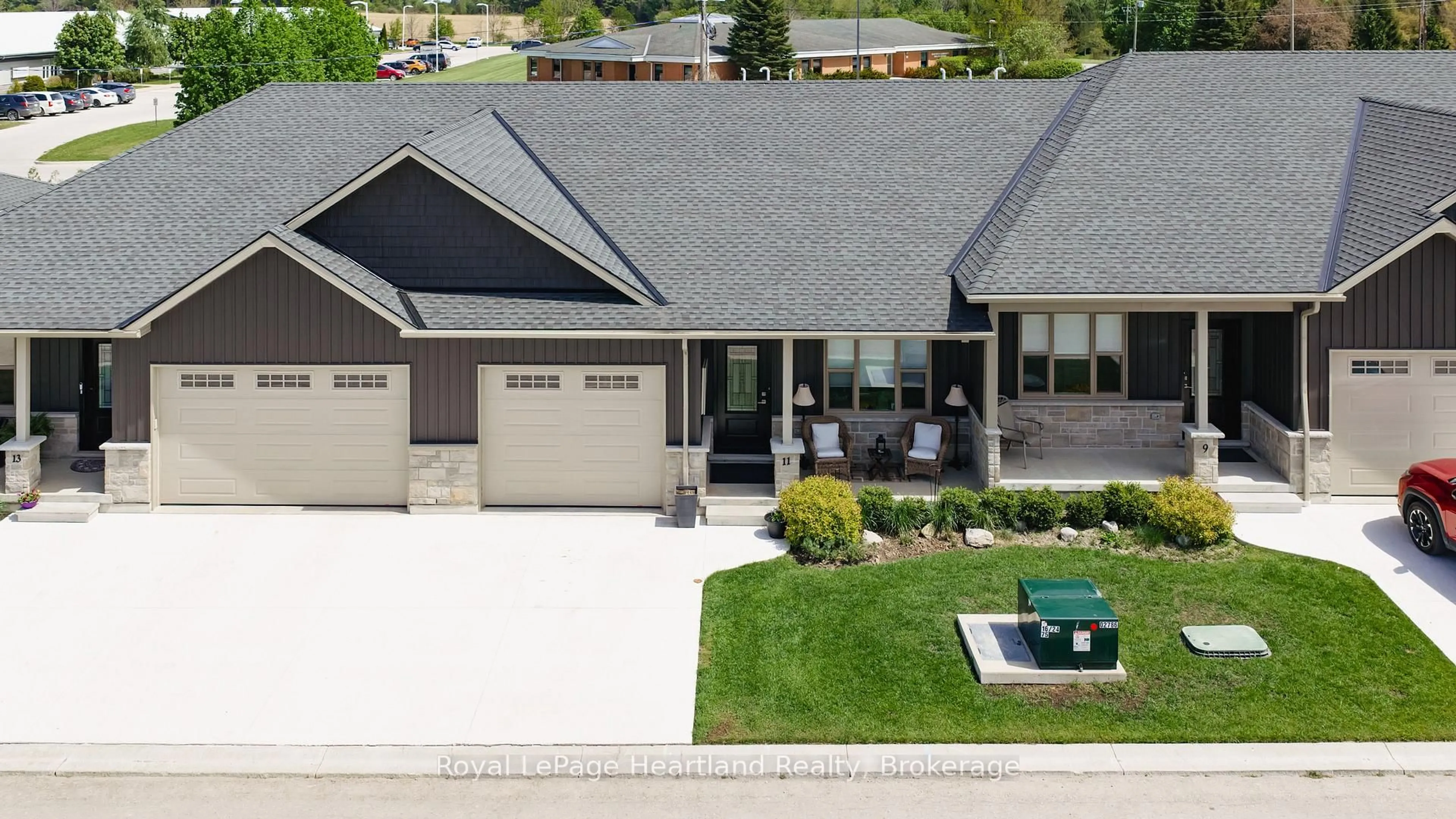 Home with vinyl exterior material, street for 11 Silver Creek Rd, Huron East Ontario N0K 1W0