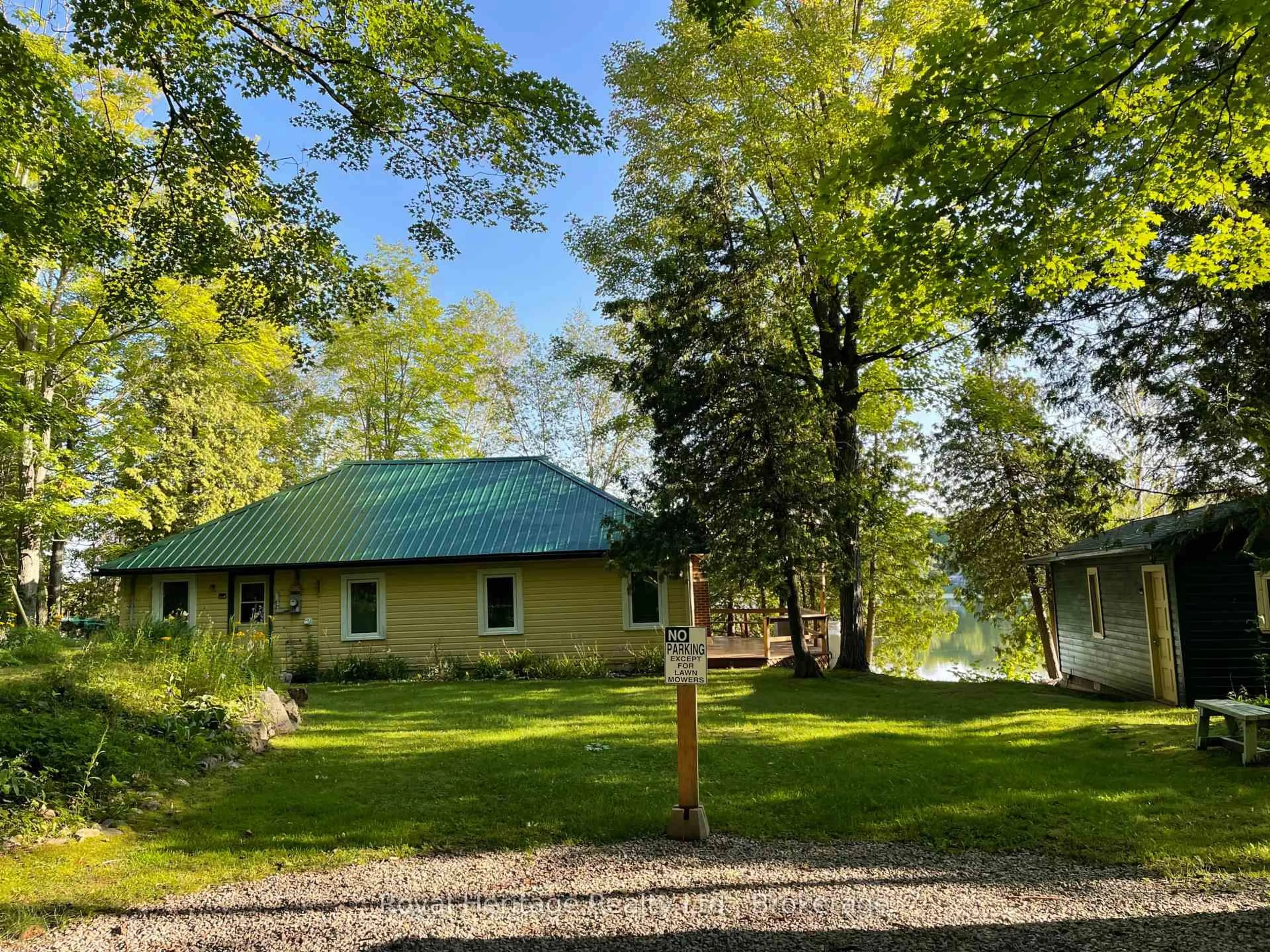 A pic from outside/outdoor area/front of a property/back of a property/a pic from drone, water/lake/river/ocean view for 1193 Lakehurst Rd, Trent Lakes Ontario K0L 1J0