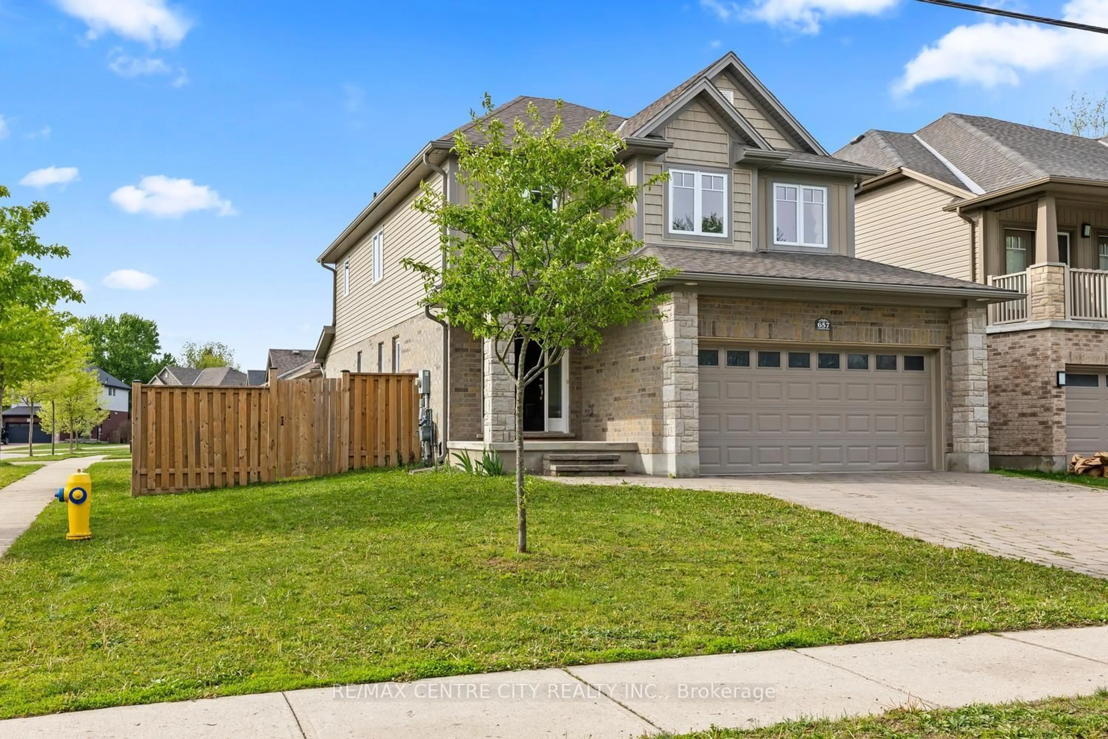 Home with brick exterior material, street for 657 Tennent Ave, London North Ontario N5X 0L2