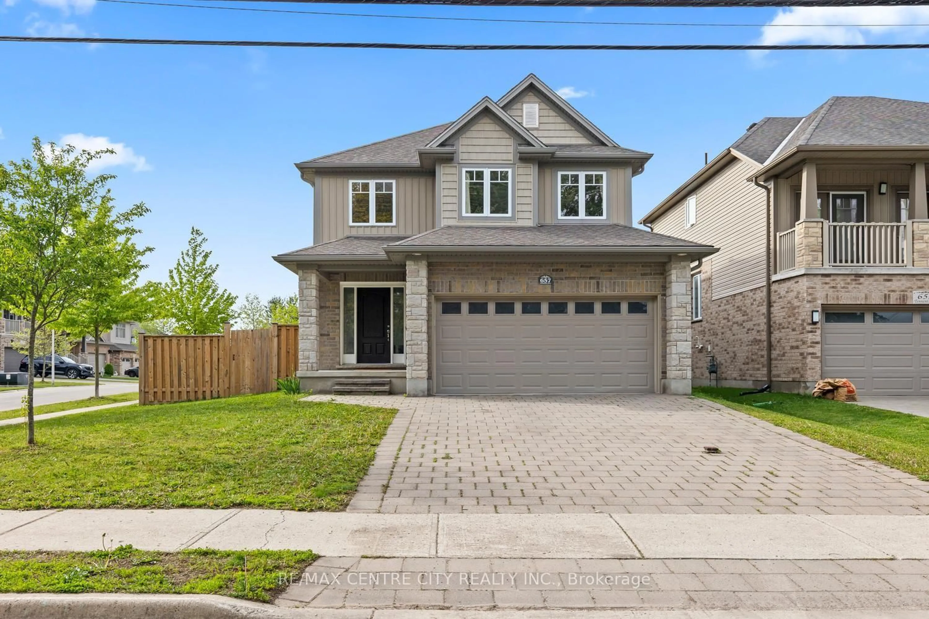 Home with brick exterior material, street for 657 Tennent Ave, London North Ontario N5X 0L2