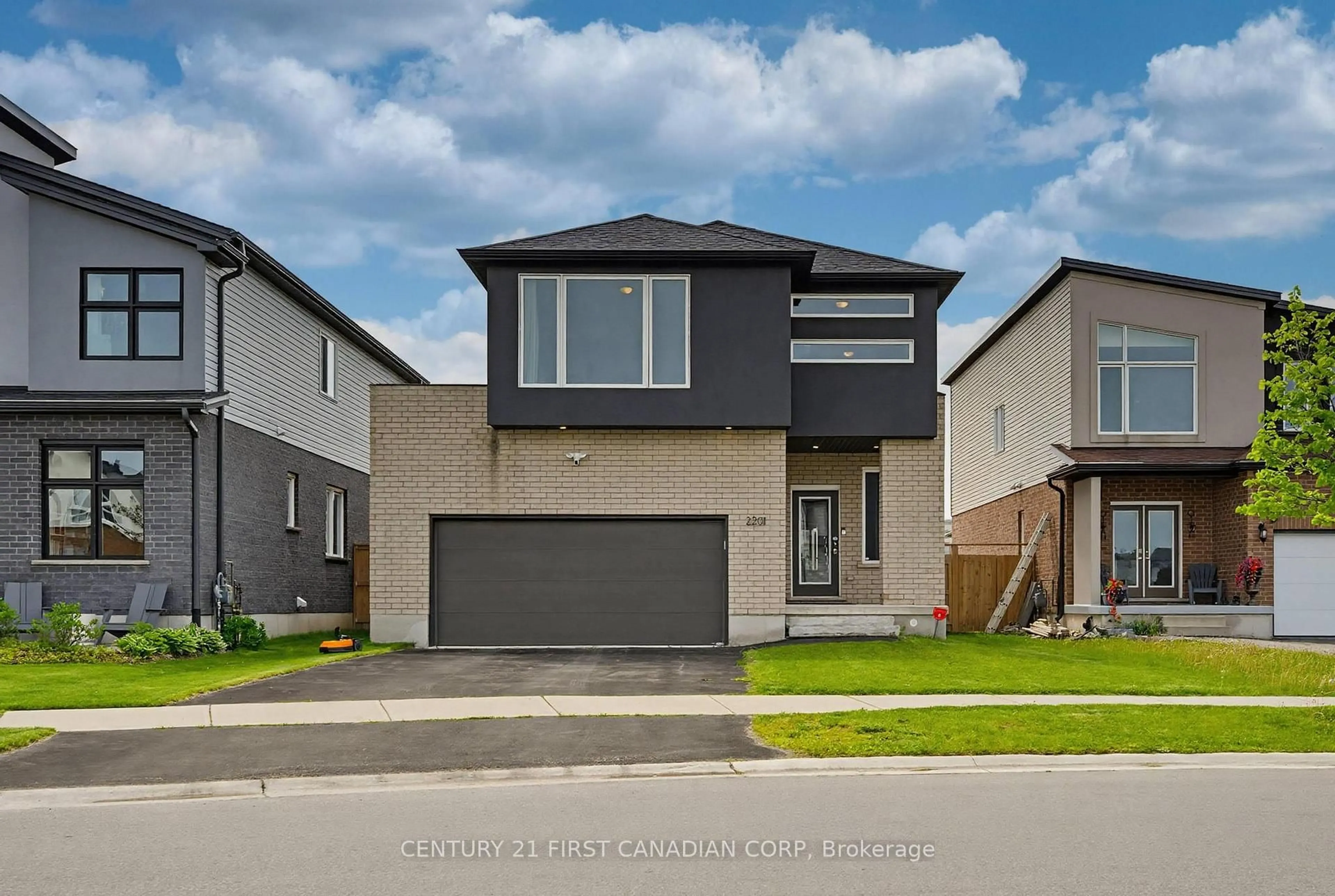 Home with brick exterior material, street for 2201 WATEROAK Dr, London North Ontario N6G 0R1