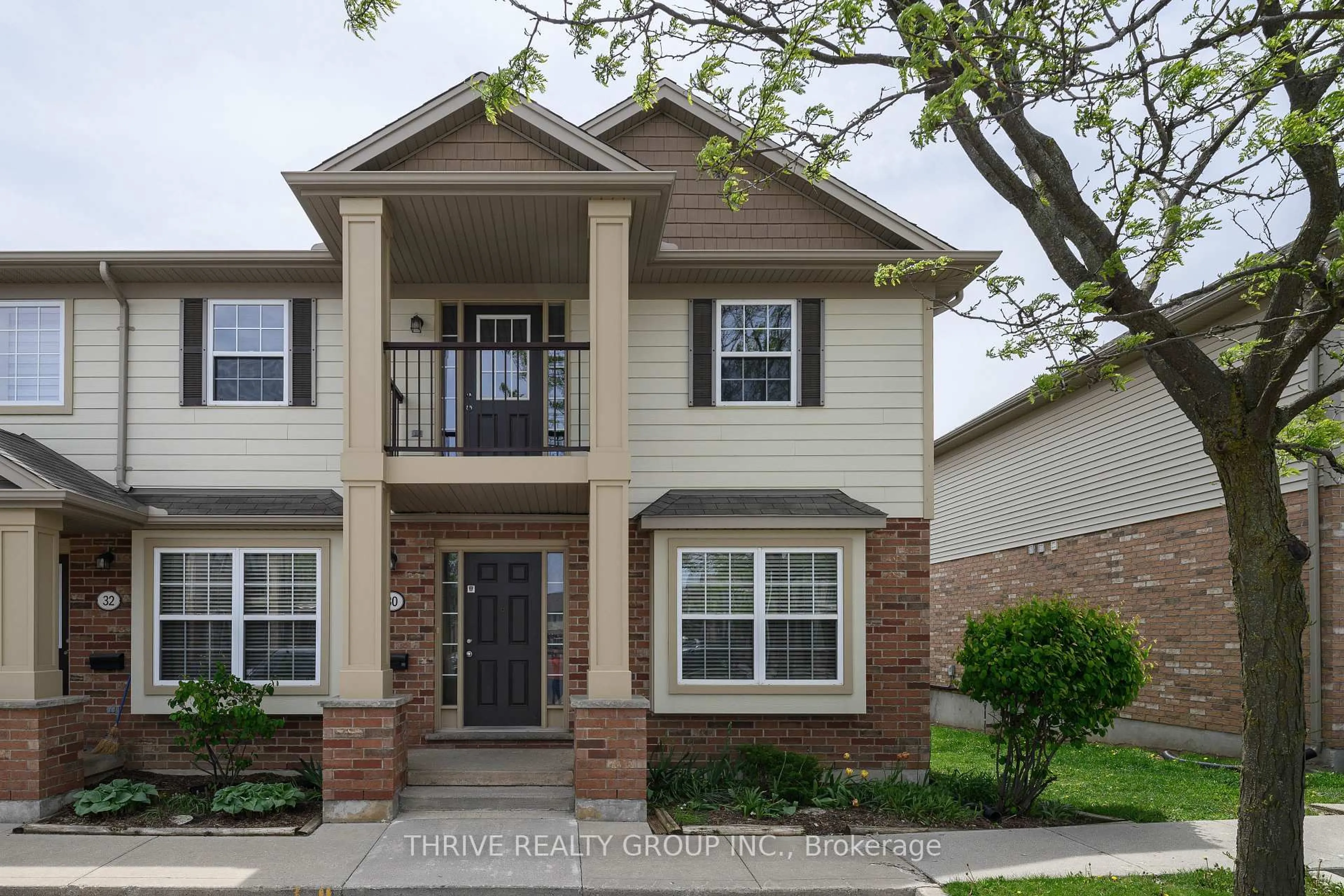 Home with brick exterior material, street for 3320 Meadowgate Blvd #30, London South Ontario N6M 0A7
