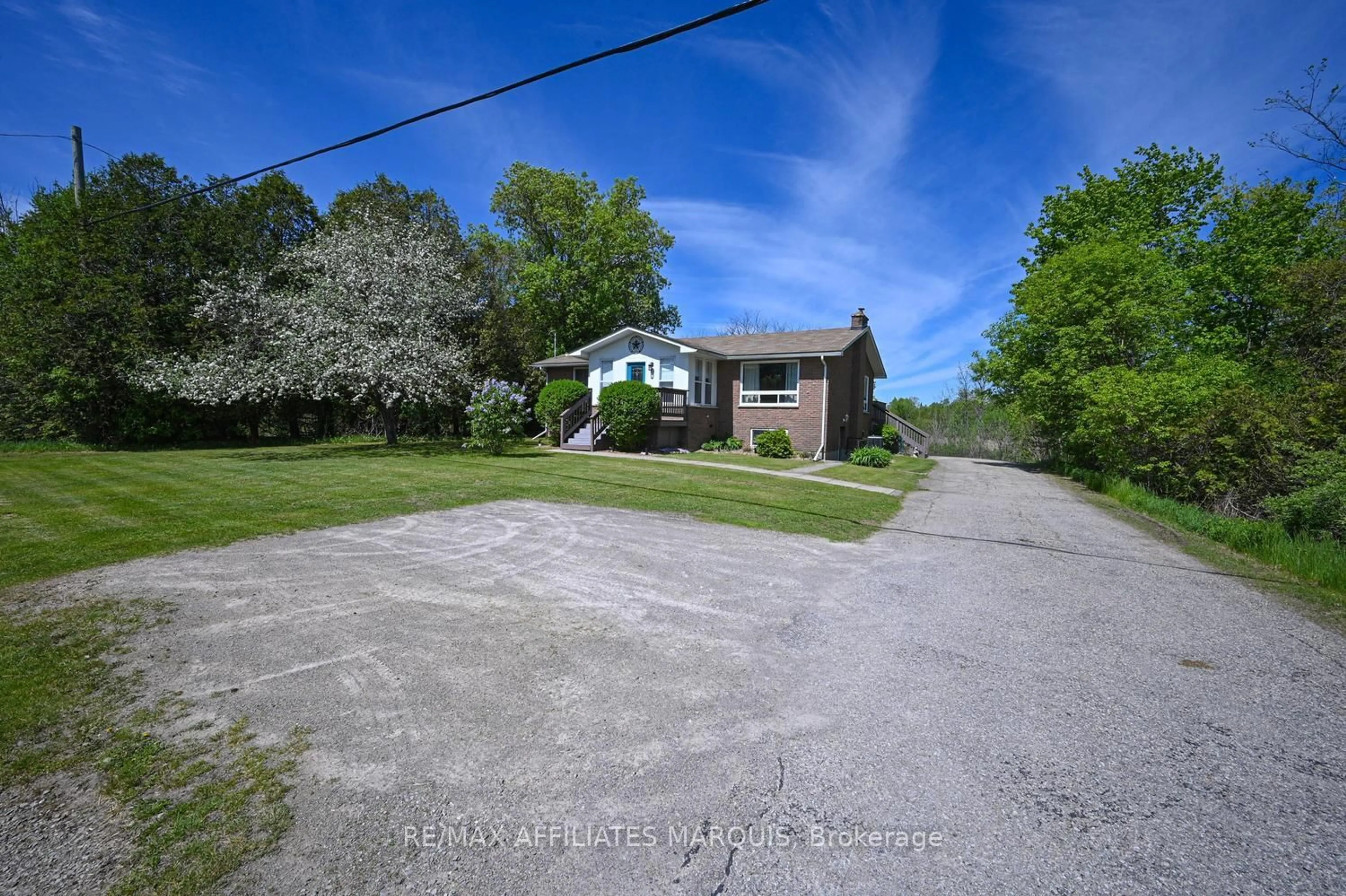 A pic from outside/outdoor area/front of a property/back of a property/a pic from drone, unknown for 344 15 Highway, Rideau Lakes Ontario K7A 5B8
