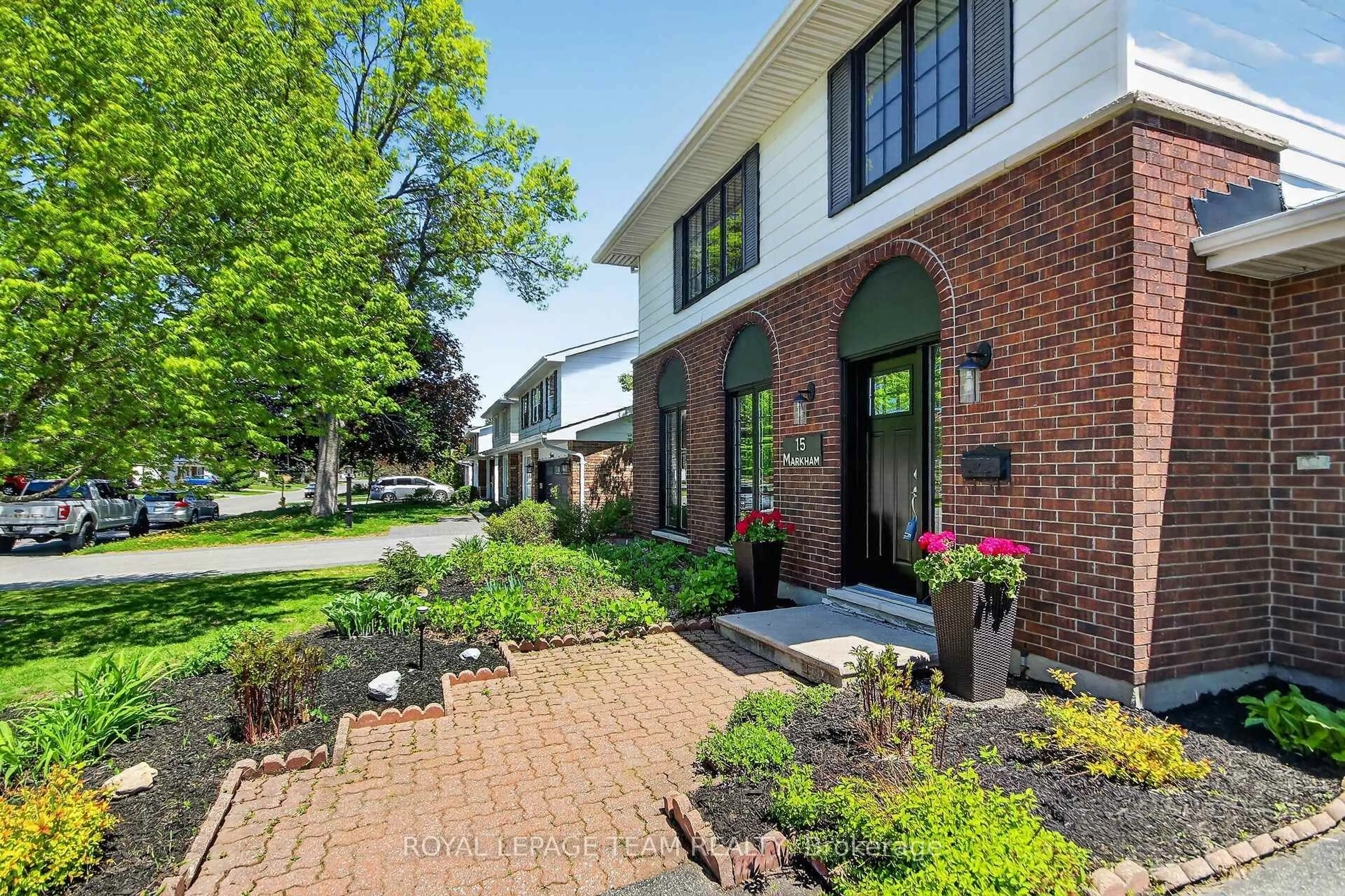 Home with brick exterior material, street for 15 Markham Ave, Ottawa Ontario K2G 3Z1