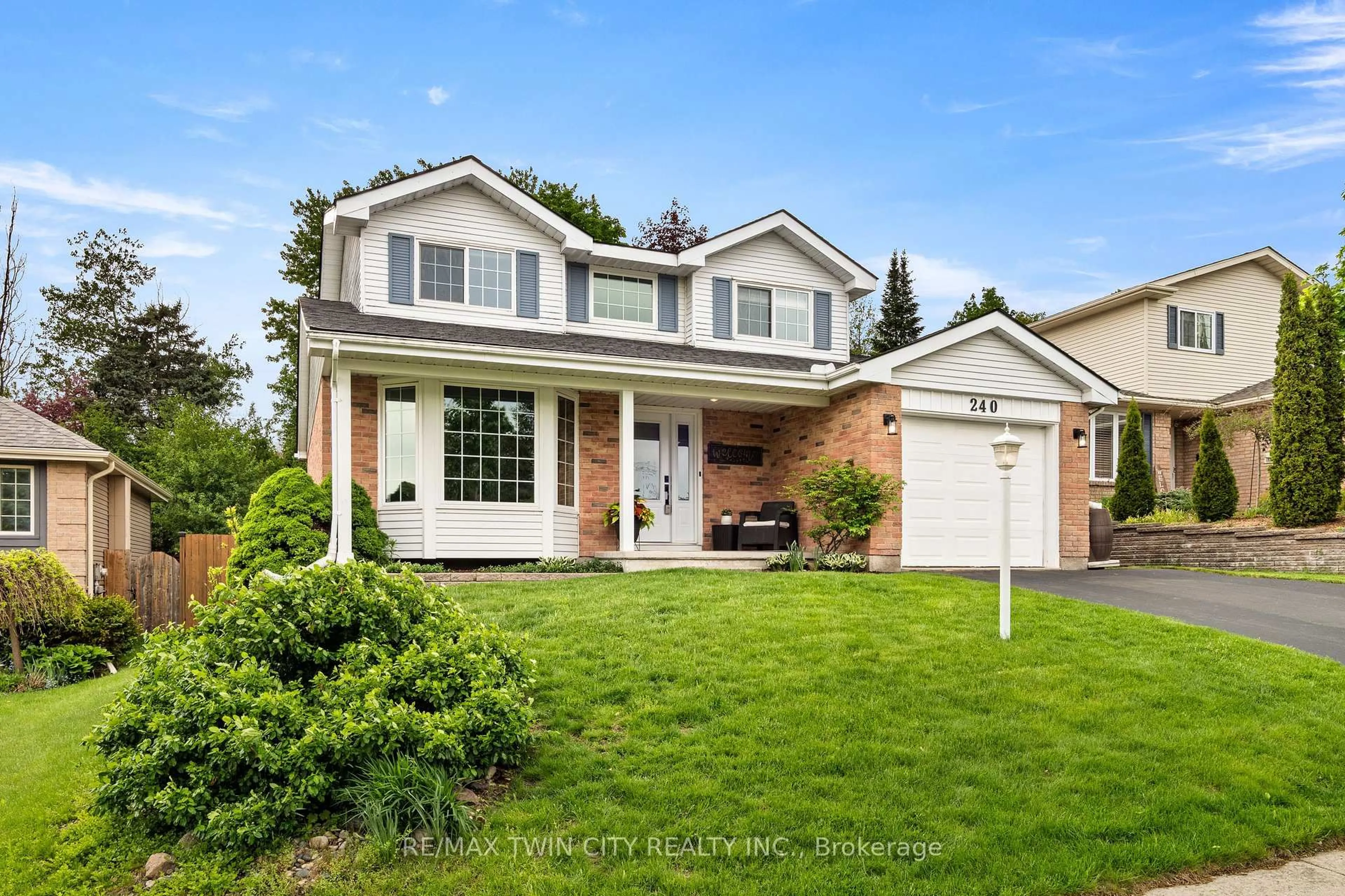 Home with vinyl exterior material, street for 240 Grand River Blvd, Kitchener Ontario N2A 3G8