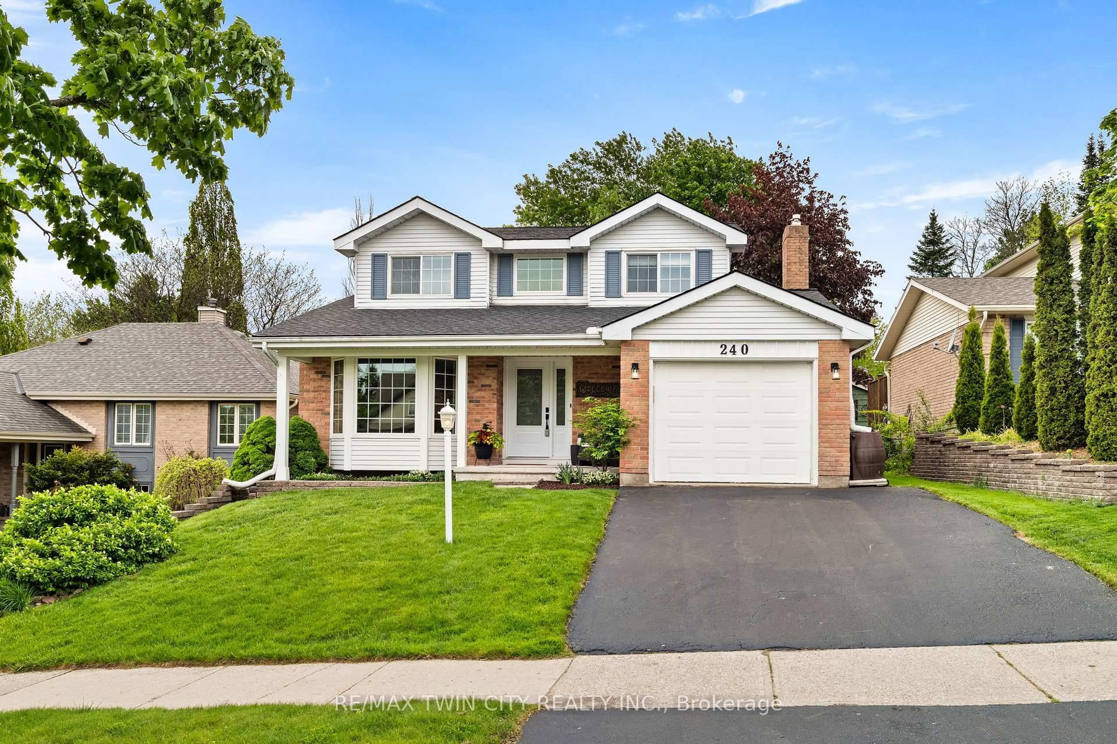 Home with vinyl exterior material, street for 240 Grand River Blvd, Kitchener Ontario N2A 3G8