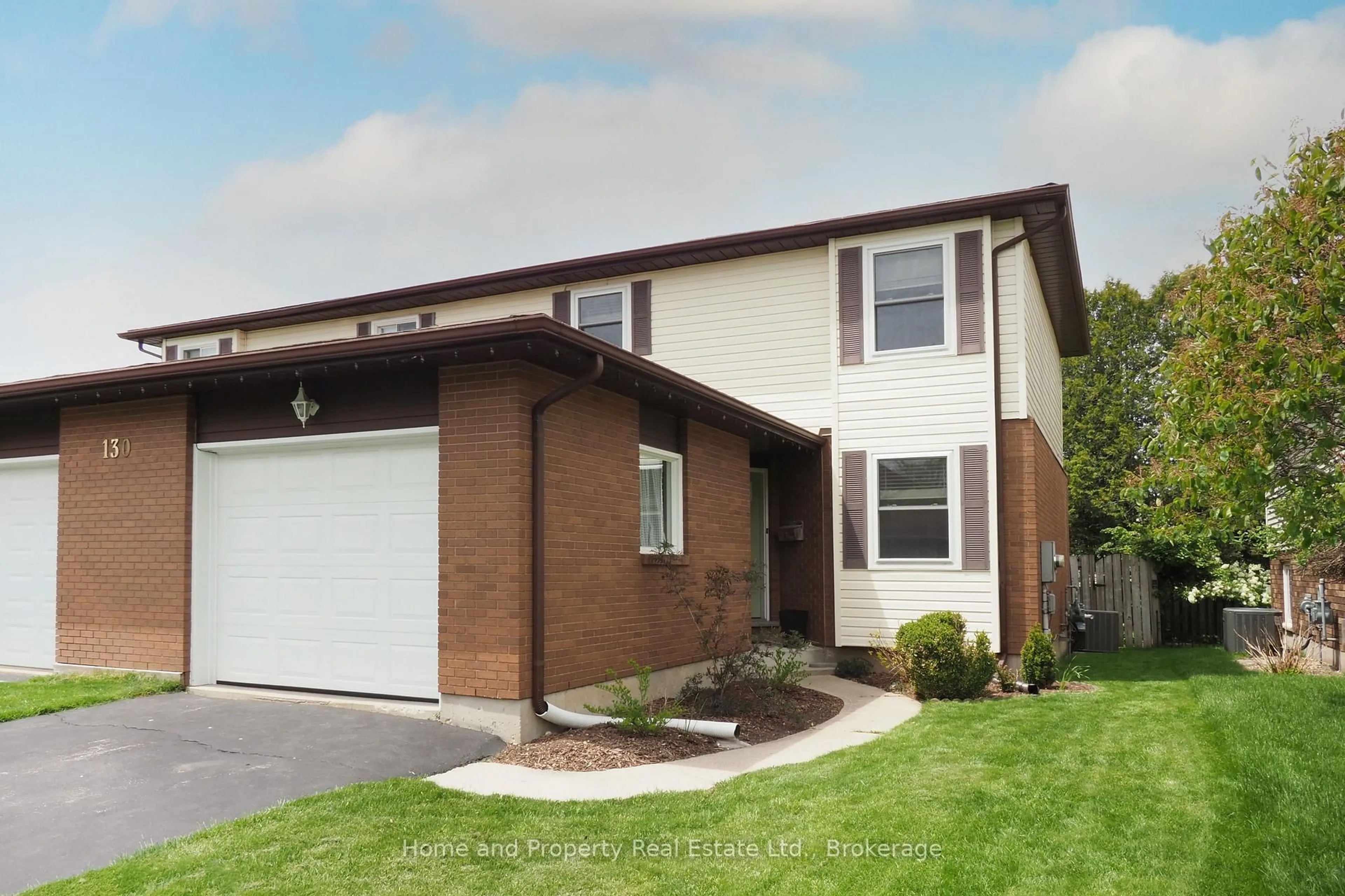 Home with vinyl exterior material, street for 130A Miller Cres, Minto Ontario N0G 2P0