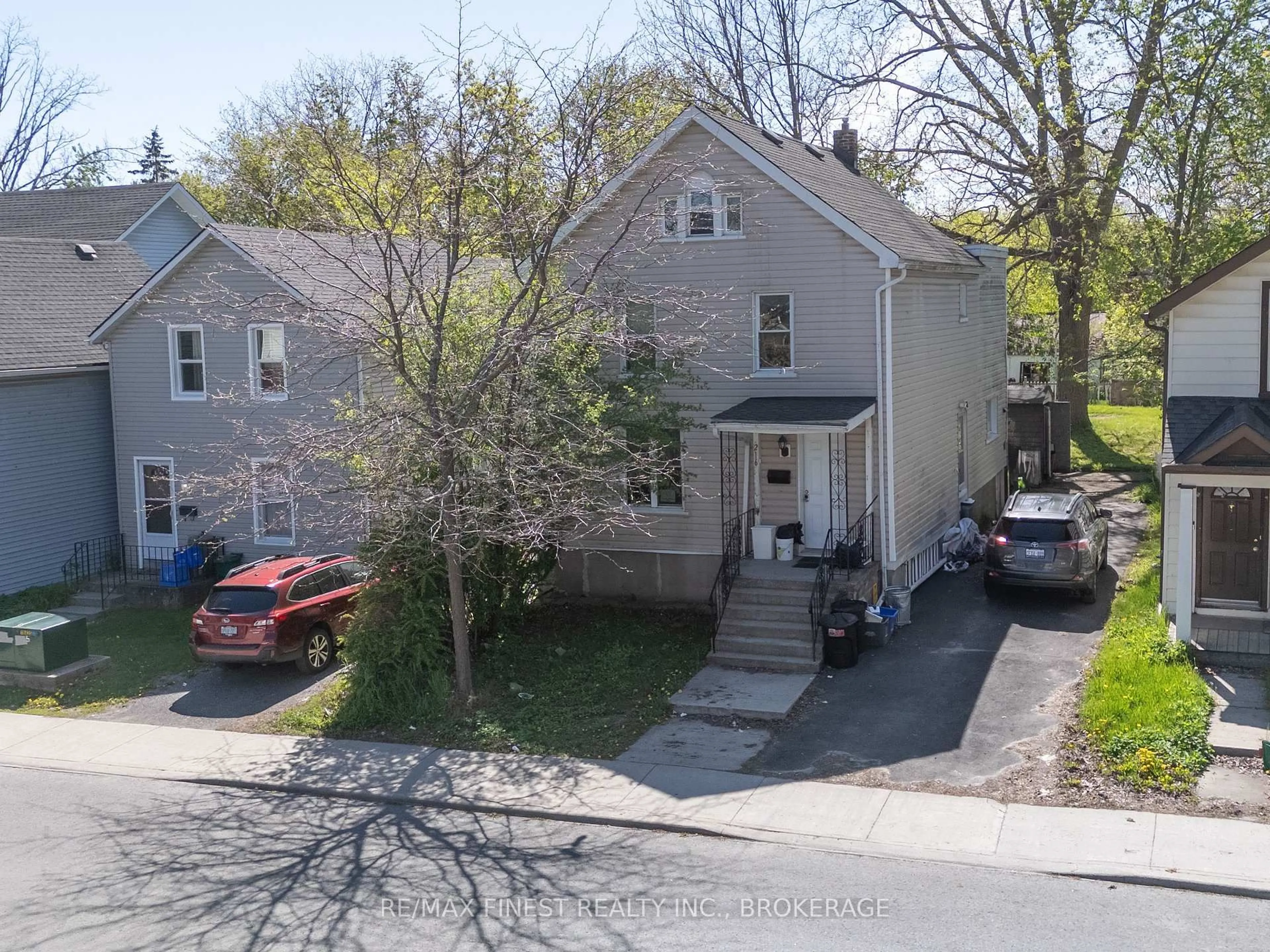 A pic from outside/outdoor area/front of a property/back of a property/a pic from drone, street for 216 Alfred St, Kingston Ontario K7L 3R9