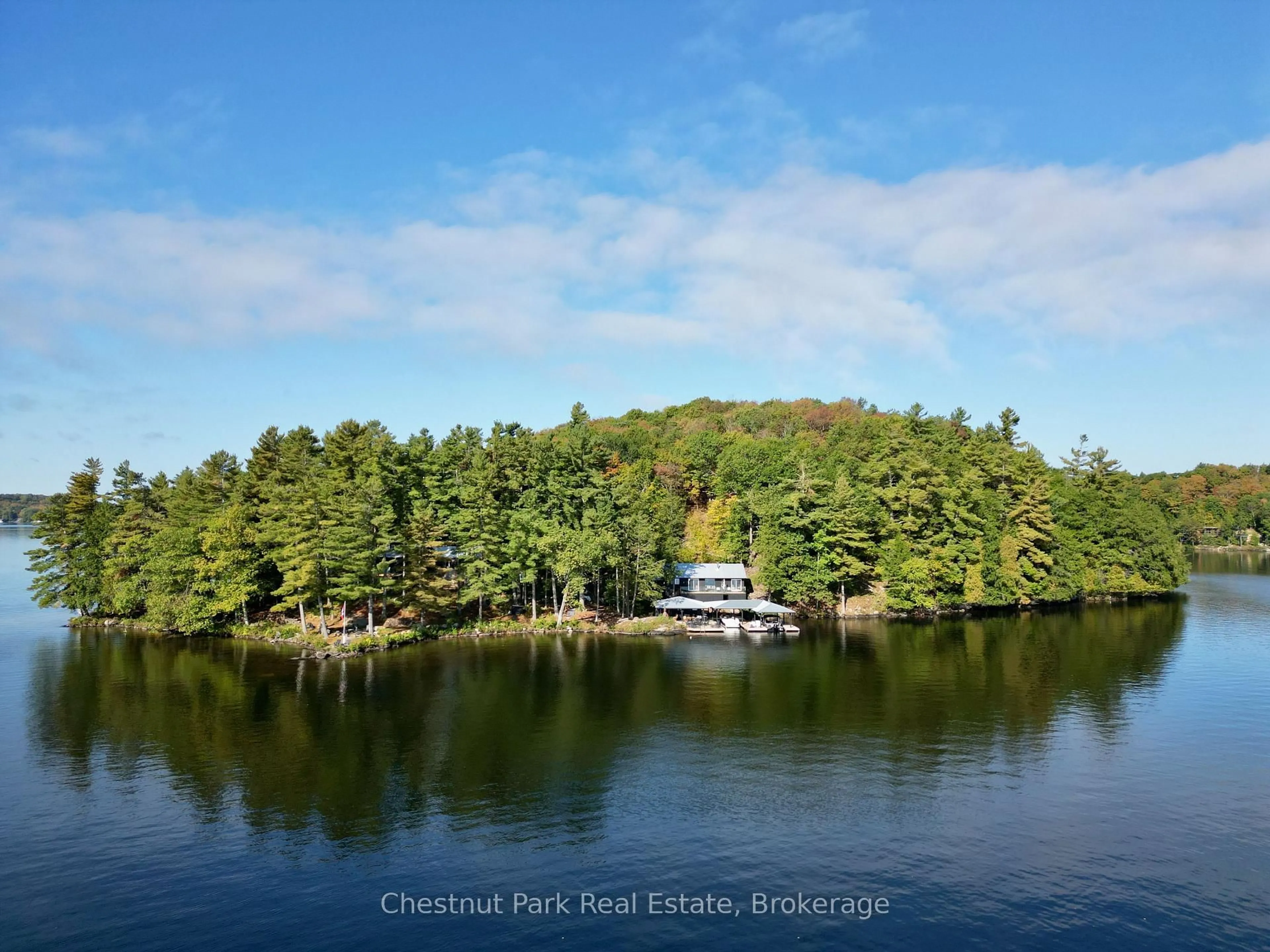 A pic from outside/outdoor area/front of a property/back of a property/a pic from drone, water/lake/river/ocean view for 5 Is Beacon Island, Muskoka Lakes Ontario P0B 1J0